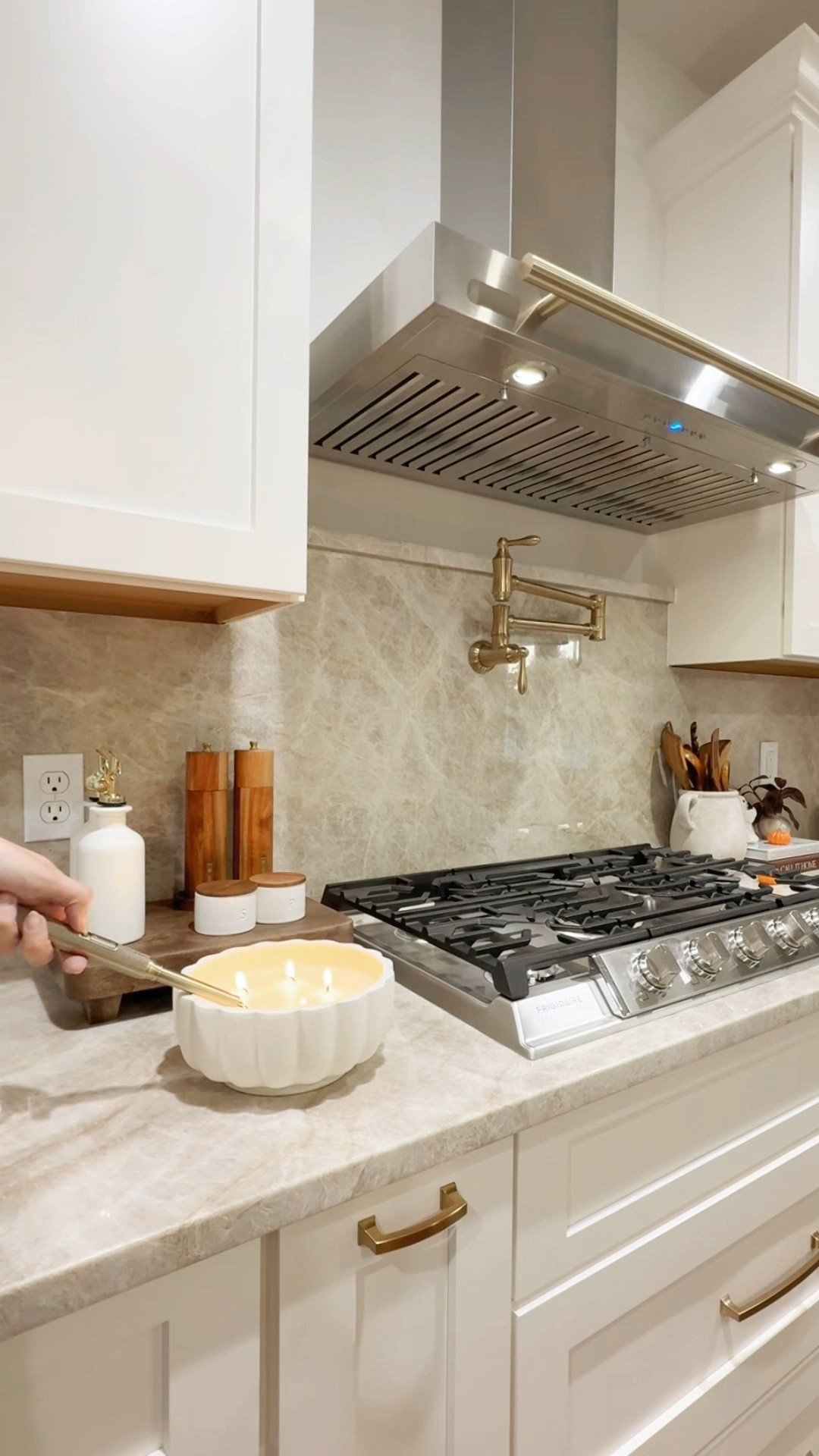 Is there any better feeling than lighting a candle when you complete your kitchen clean? 🥰 

We’re still working on styling this area, but I’m loving our finds so far!

#LTKStyleTip #LTKFamily #LTKHome