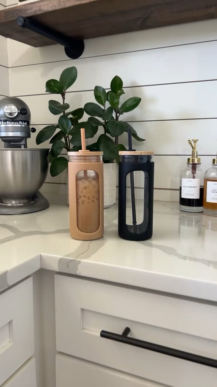 Iced coffee glass and silicone tumbler with straw cups In home coffee bar coffee station open shelving shelf styling kitchen shelves vases cake plate wooden bowls cutting board charcuterie white canister set stand mixer espresso machine coffee maker syrup bottles honey dispenser amazon target hearth and hand creative co-op Gevi favorites and finds home decor 

#LTKstyletip #LTKFind #LTKhome