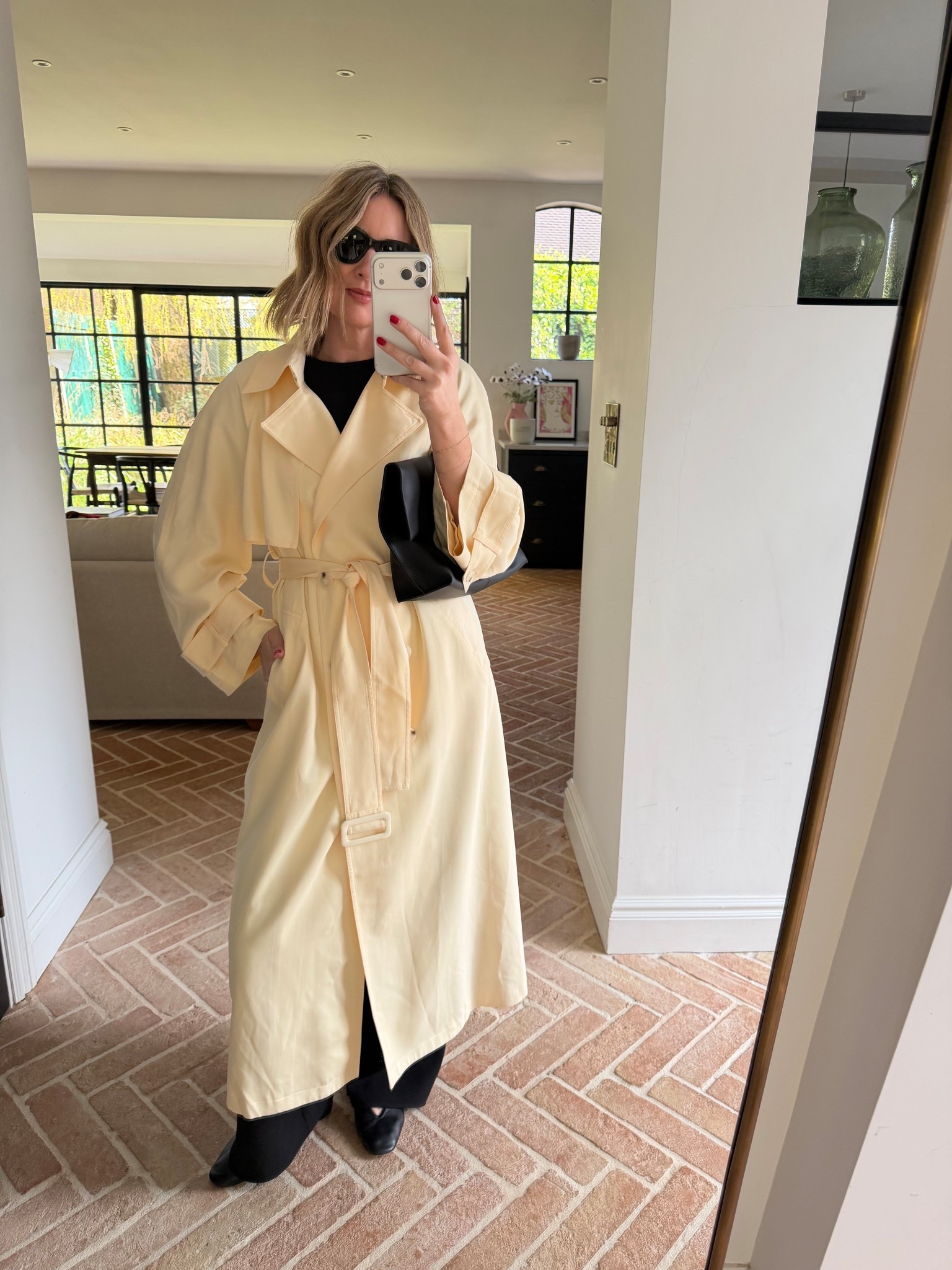 Trench Coat | Clutch Bag | Ballet Flats | Black Jeans | The White Company 

 #LTKuk #LTKspring #LTKeurope