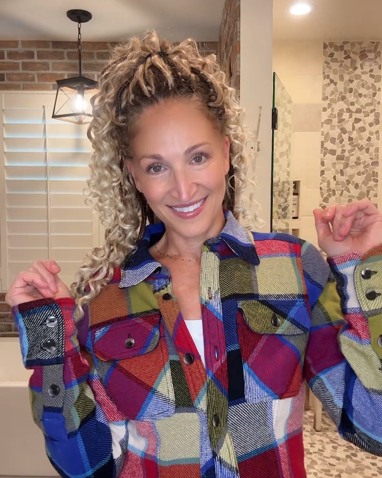 Colorful, warm fall button down. Can be worn buttoned or unbuttoned. Perfect for layering. Investment piece. Very nice quality and the colors are stunning.  It is on the short side—so it cinches in your waist. If you have wider hips—that moves the eye up away from your hips and gives you a more flattering silhouette at the waist. Very pretty and flattering!  True to size. I am wearing a small.  So easy to pair with jeans and some casual boots or sneakers.

#LTKOver40 #LTKSeasonal