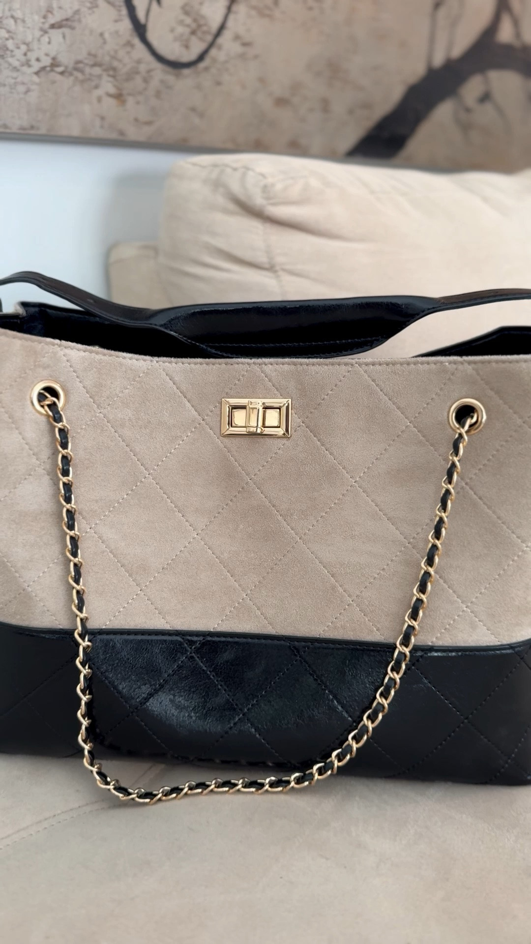 Neutral, chic, and giving quiet luxury vibes. This two-tone quilted tote is the kind of bag that instantly elevates every outfit. The black + cream combo with gold chain details makes it look designer-inspired without the designer price tag. Perfect for work, travel, errands, or your everyday “throw everything in and go” bag. Obsessed with how classy and versatile this one is! 

#LTKStyle #LTKItBag #NeutralStyle #QuietLuxuryStyle #EverydayBag #ToteBagStyle #FashionFinds #ChicStyle #AffordableLuxury #CapsuleWardrobe #StreetStyleFashion #MinimalStyle #DesignerInspired #BagObsession #OOTDInspo #ClassicStyle #ViralFashion #LTKUnder100 #ModernStyle #NeutralAesthetic #FashionInfluencer #TrendingNow #StyleInspo #LuxuryLookForLess #HandbagAddict

neutral tote bag • quilted tote bag • black and cream purse • designer inspired handbag • affordable luxury bag • everyday tote purse • chic work bag • trendy handbags 2026 • quiet luxury accessories • gold chain tote • neutral handbag outfit • classy tote bag • large everyday purse • modern fashion accessories • capsule wardrobe bag • stylish tote for women • urban expressions tote • eliana tote • minimalist handbag • work tote aesthetic @Urban Expressions

#LTKOver40 #LTKootd #LTKvlog