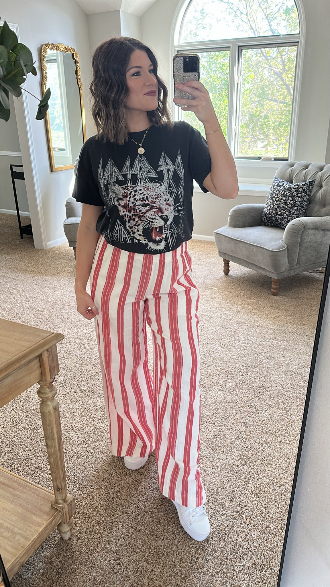 Patterned linen pants are so fun to style for Spring! Plenty of room for the growing bump too. This graphic band tee is a few years old from Target, but linking a few similar! 

#LTKbump #LTKfindsunder50 #LTKstyletip