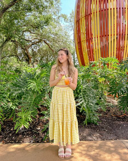 Summer wardrobe: activated ☀️💛🌼 #luluspartner
  
Best feeling? Hopping off the plane & immediately exploring the resort with a fruity drink in hand! Full outfit from @lulus & linked on my LTK. Wearing a small in this set! Super breathable & so comfortable.
  
#waltdisneyworld #disneystyle #disneycreators #disneyadult #disneyinsta #vacationstyle 