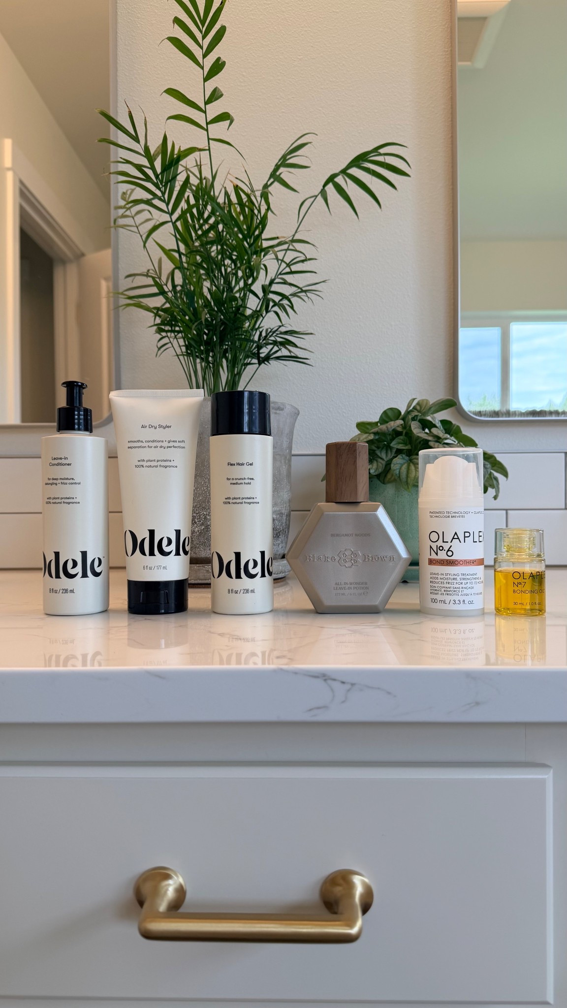 Sharing my current curly and wavy hair styling lineup because these products have been doing so much for my hair lately 🌀✨ Everything on my counter right now is linked! I have been loving the Odele Vegan Leave-In Conditioner for moisture and frizz control, the Odele Air Dry Styler for those no-heat days when I just want to let my waves do their thing, and the Odele Flex Hair Gel for a little flexible hold without crunch. The Olaplex No. 6 Bond Smoother is a staple I keep coming back to for smoothing and the Olaplex No. 7 Bonding Oil gives the most beautiful shine and heat protection. I mix the two together in my hand and then apply. And the Blake Brown All-In-Wonder Leave-In Potion is a newer addition to my routine that I am really loving. If you have curly or wavy hair and are looking for products that actually work these are all worth trying. Everything is linked! 🛒 

 #LTKselfcare #LTKOver40 #LTKBeauty