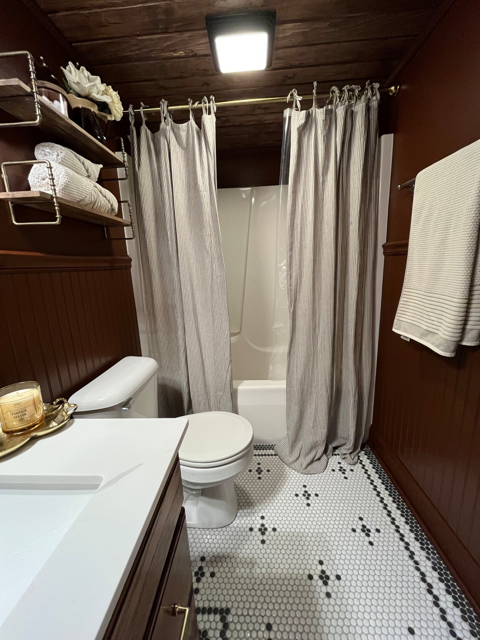 Regular curtains as shower curtains! 
#bathroomtips