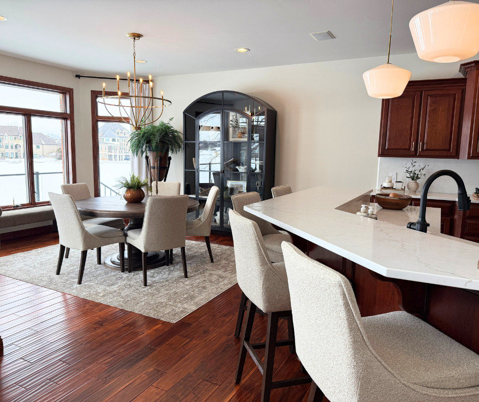 This kitchen was quite the transformation and the furniture selected deserves all the credit. 

Timeless pieces that add both elegance and functionality to a well used space. 

Kitchen chairs + coordinating bar stools for a cohesive look. 

Lighting that makes a statement, but doesn't take away from their incredible water view.  

 #LTKSeasonal #LTKHome #LTKSaleAlert