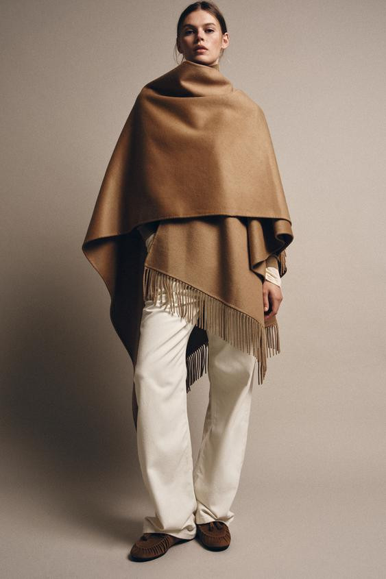 NEWFRINGED WOOL LONG CAPE$ 169.00Mid-camel | 8491/209/756Add to cartAddOpen long cape crafted in ... | Zara US
