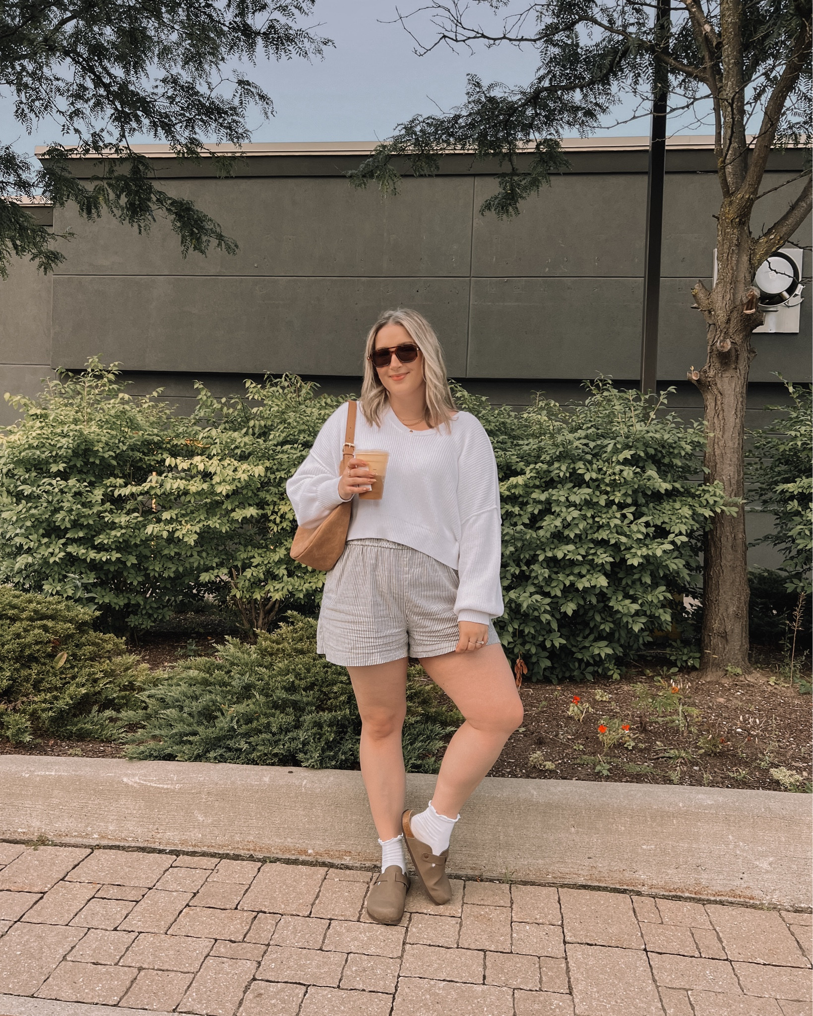 I love a sweater and shorts combo for a comfy summer to fall transition outfit! This is the perfect cropped sweater, runs a little big, I’m wearing M. My boxer shorts are fully lined with pockets, but run small, I sized up to XL. My Birkenstock inspired clogs are so comfy! I went up half a size 


#LTKautumn #LTKmidsize #LTKcanada