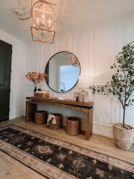 Home decor!! Entry way complete. Console table, home decor pieces, faux eucalyptus tree, mirror, rug (10% off with code ALWAYSMELISS10 ), baskets, storage boxes, and chandelier are all linked! Neutral home decor.c Amazon finds, Amazon home, target , large round mirror is 48"



#LTKstyletip #LTKhome #LTKunder100