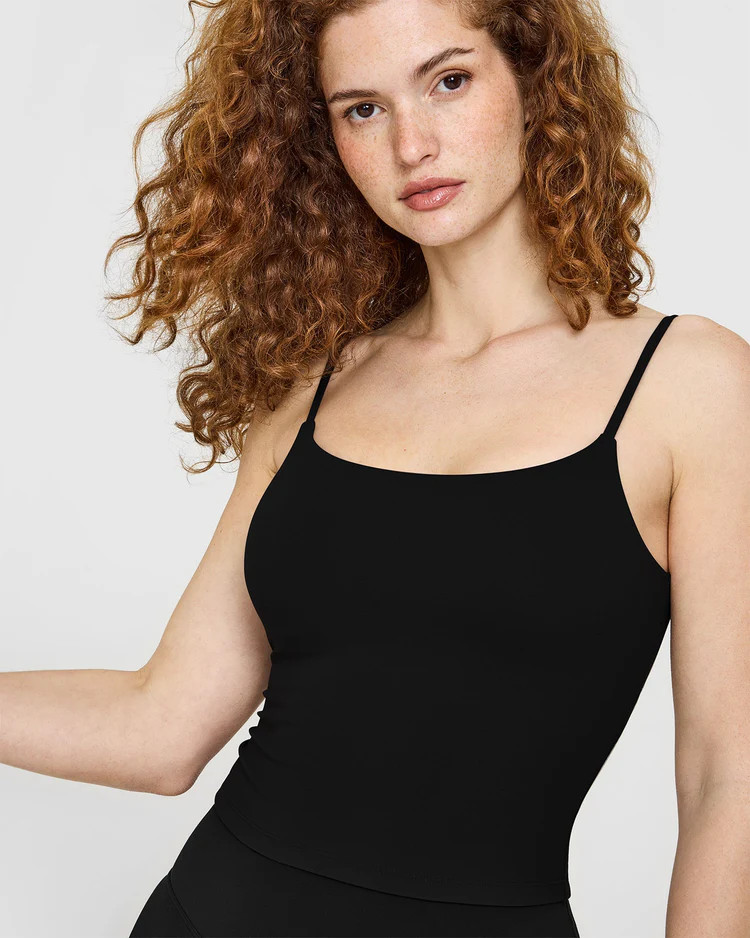 SoftMotion™ Strappy Mid Tank Top with Built in Bra Shelf with White Logo 
 Black | Oner Active (UK / US)