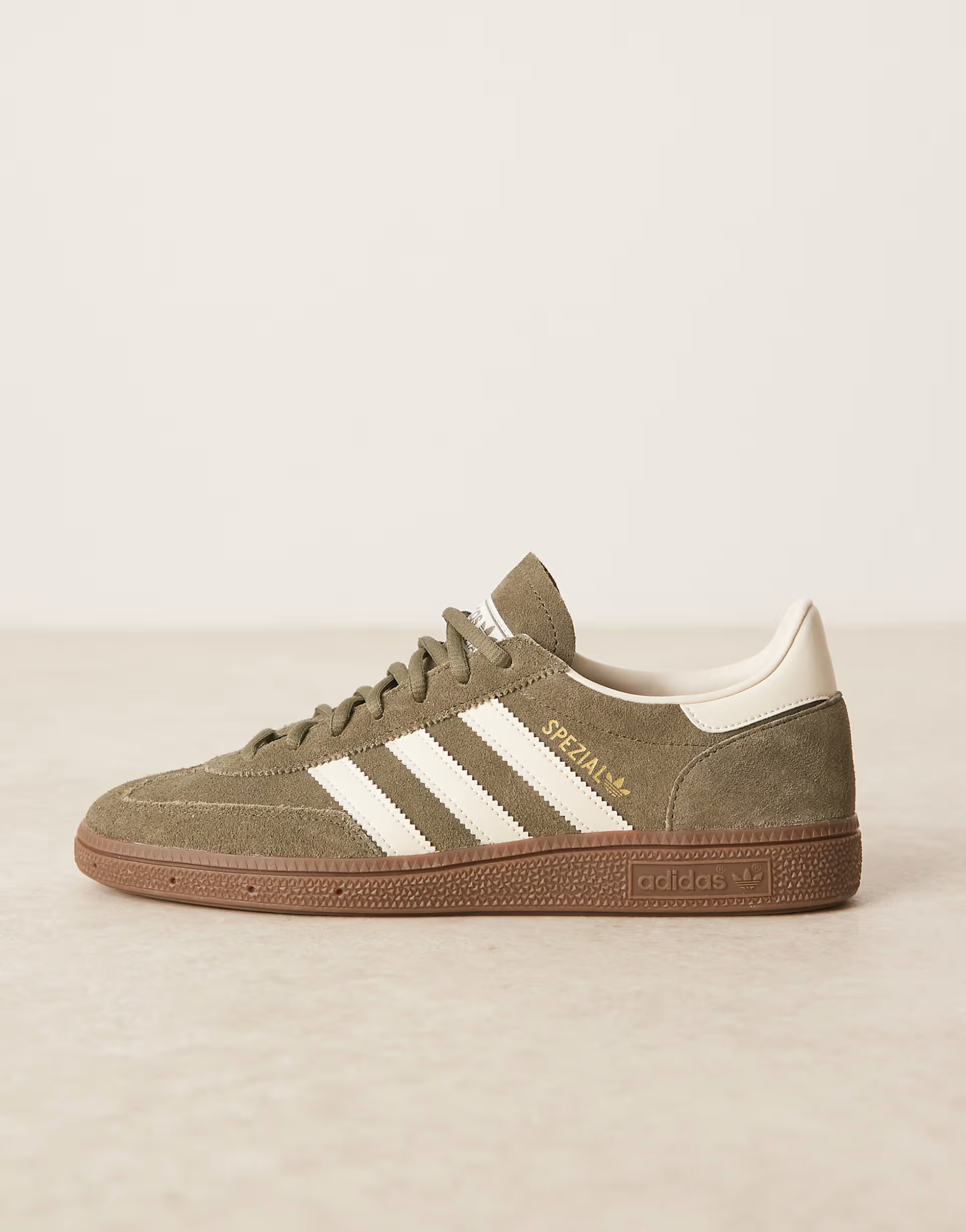 adidas Originals Handball Spezial trainers in olive and cream with gum sole | ASOS (Global)