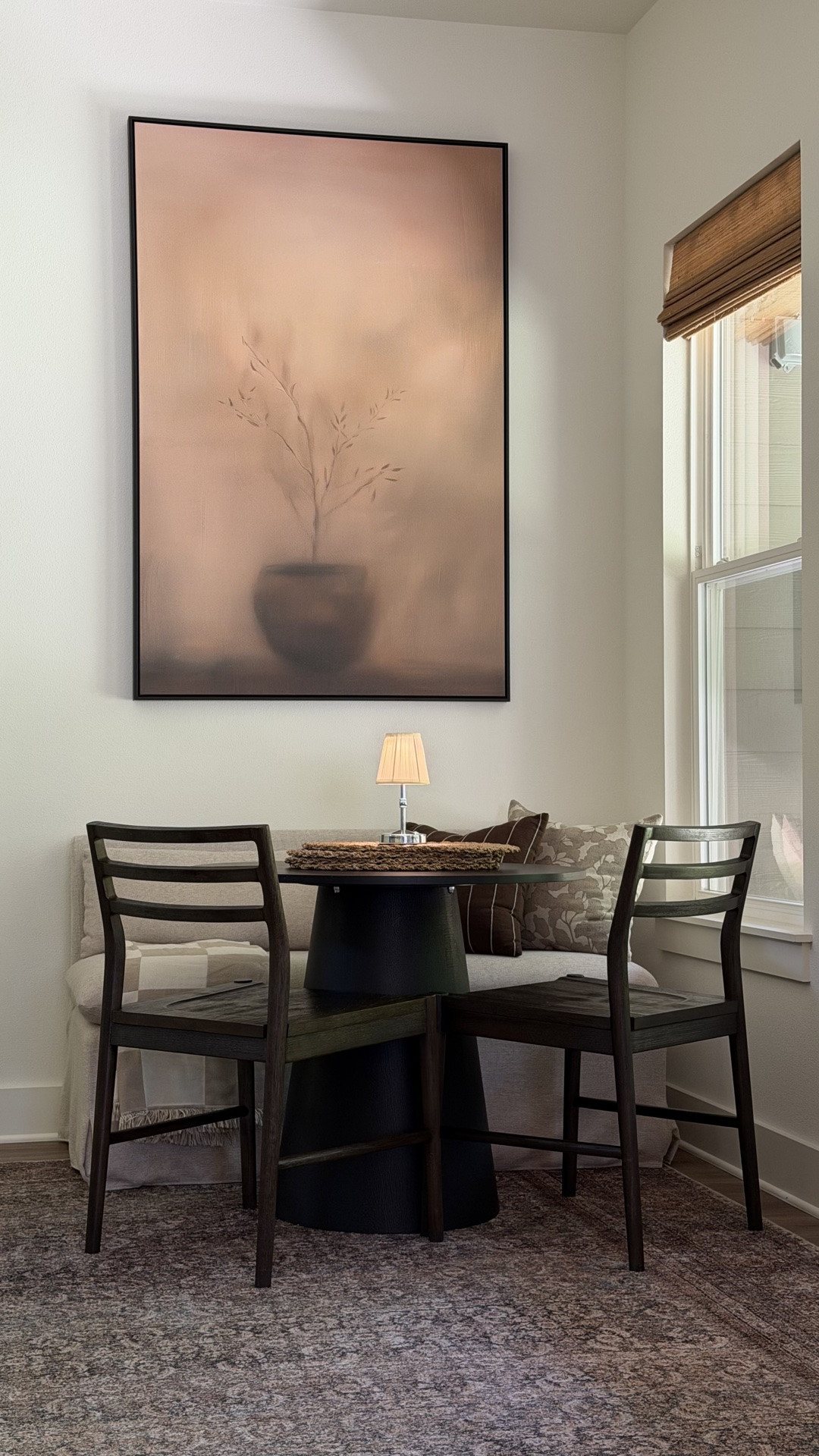 Dinning Room Makeover ✨Comment SHOP for links! 
Our most hated room finally got a makeover 2 years into living in this home. It’s the center point and access space to the back patio, laundry room, stairs, garage and primary bedroom. 

This space got the biggest makeover just by adding a large area rug from @loloirugs #ad I went with one of my favorites from @amberinteriors Cambria Collection CBR-07 in Ocean/Bark. 

I’d love a larger dinning table for the space but it’s just not practical blocking everything around it. So a small nook with a dinning bench, small round table and chairs was the way to go. 

It’s given my littles a place to do crafts, play and eat which is all a mama needs. 

Dinning bench @crateandbarrel 
Table @wayfair 
Chairs @potterybarn 
•
•
•
Interior Design | Home Inspo | Makeover | Dinning Room | Dinning Nook | Home Decor | Home Decorating |