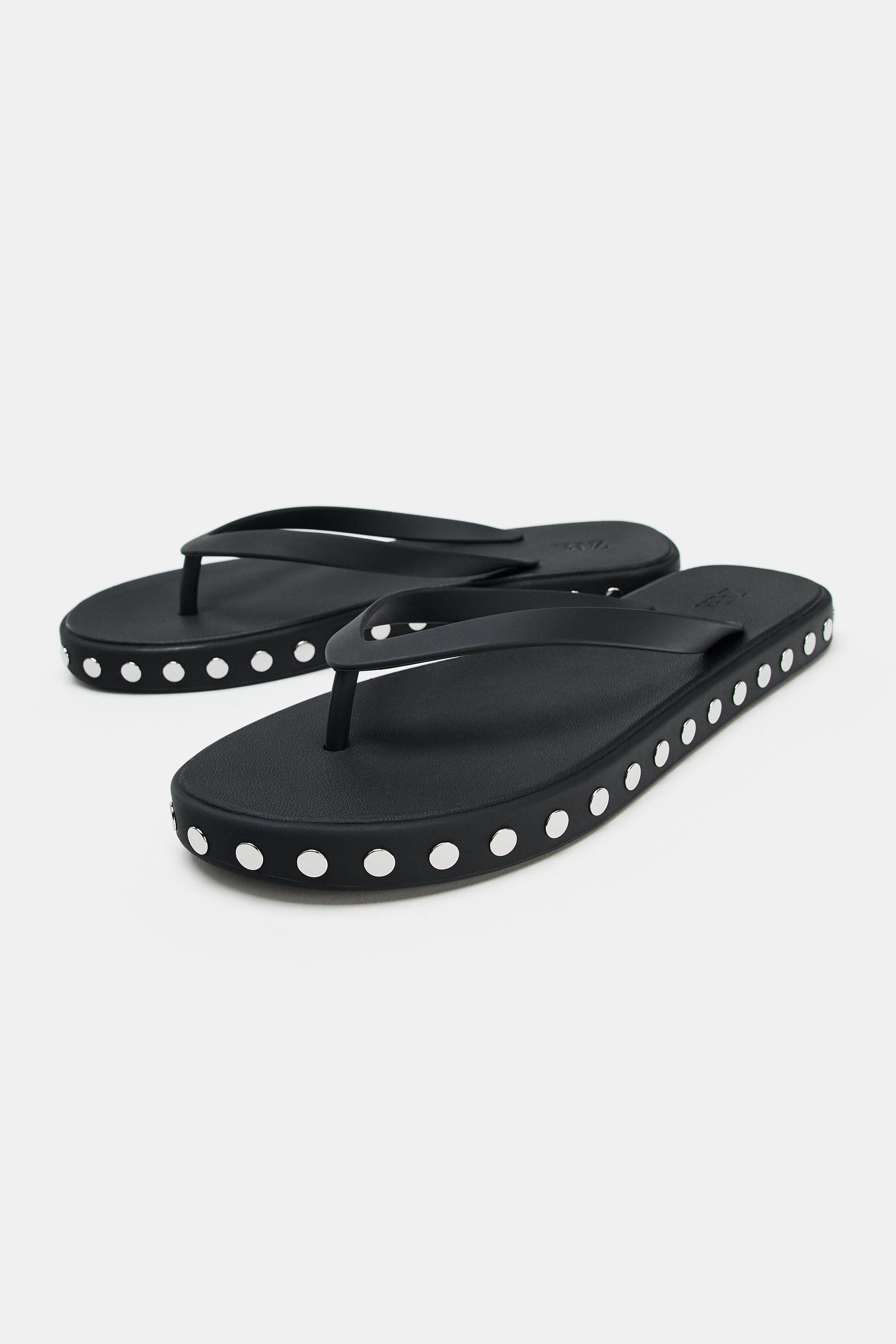 Model height: 178 cmFlat sandals. Metal stud detail on the sole and toe-post strap. Round toe.Sol... | Zara UK