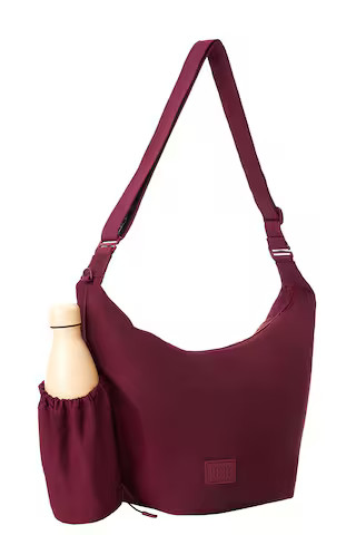 The Crescent Catchall Bag in Burgundy | Revolve Clothing (Global)
