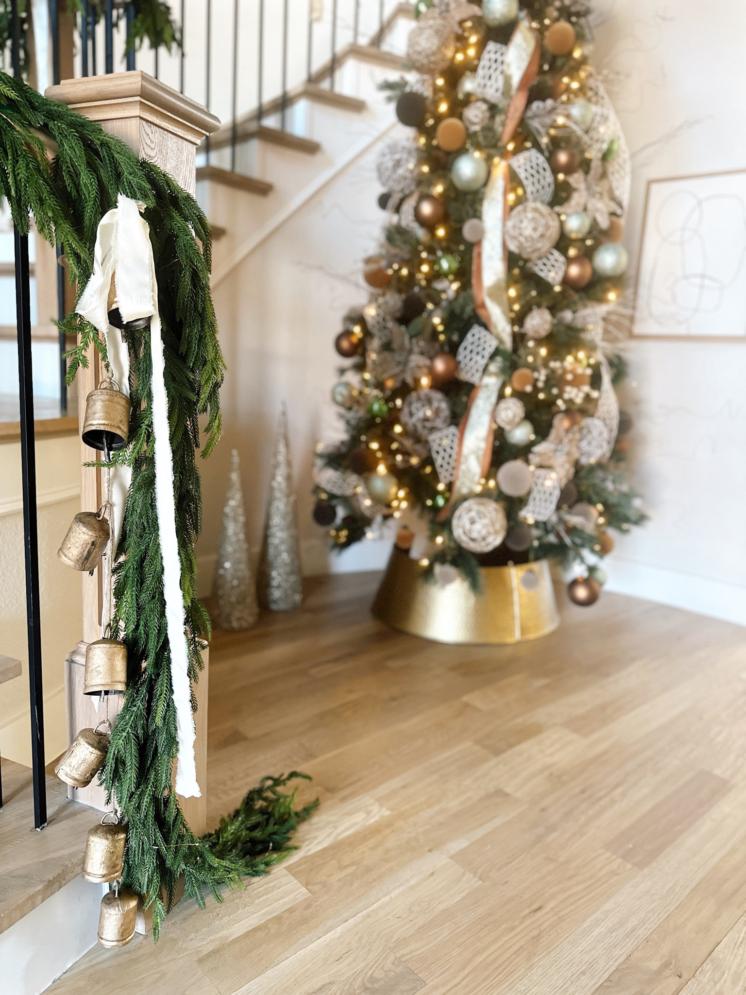 Love these Christmas bells and satin frayed ribbon! 

Staircase garland. Norfolk garland. Christmas garland. Christmas staircase. Christmas tree. Neutral Christmas. Christmas bows. Christmas ribbon. 

#LTKHoliday #LTKSeasonal #LTKhome