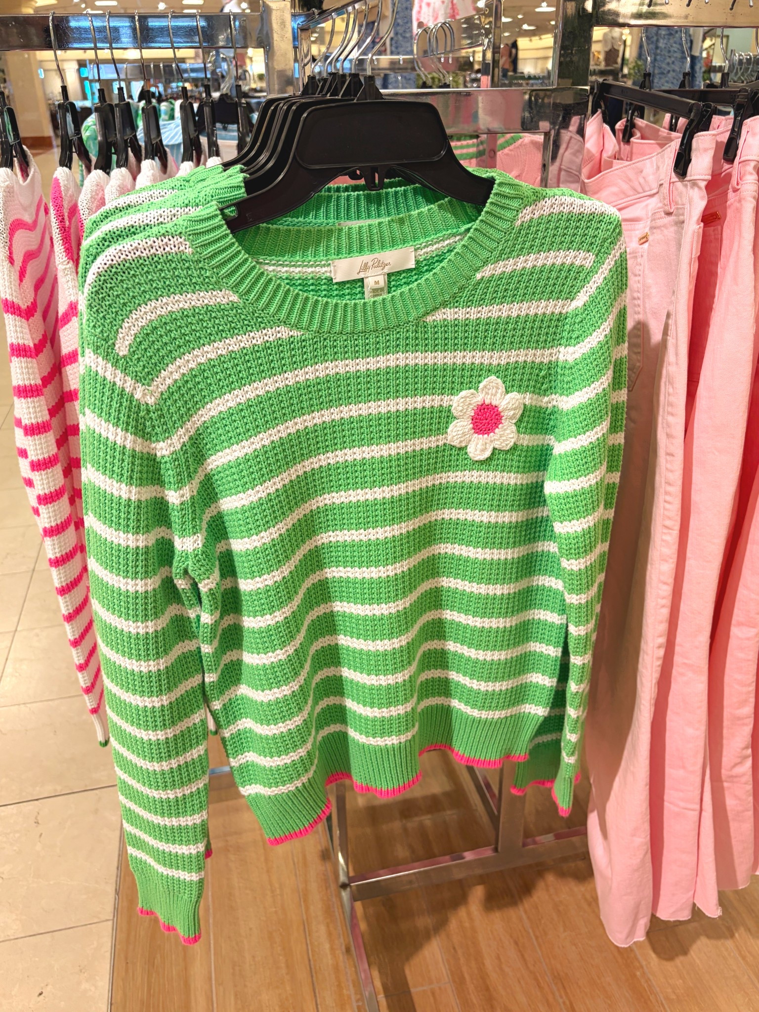 You’ll be ready for those cool Spring and Summer nights with this adorable pullover cotton sweater!  It’s eye-catching with its green and white stripes and crocheted flower detail!  

Lilly Pulitzer sweaters 
Spring sweater
Striped sweaters 