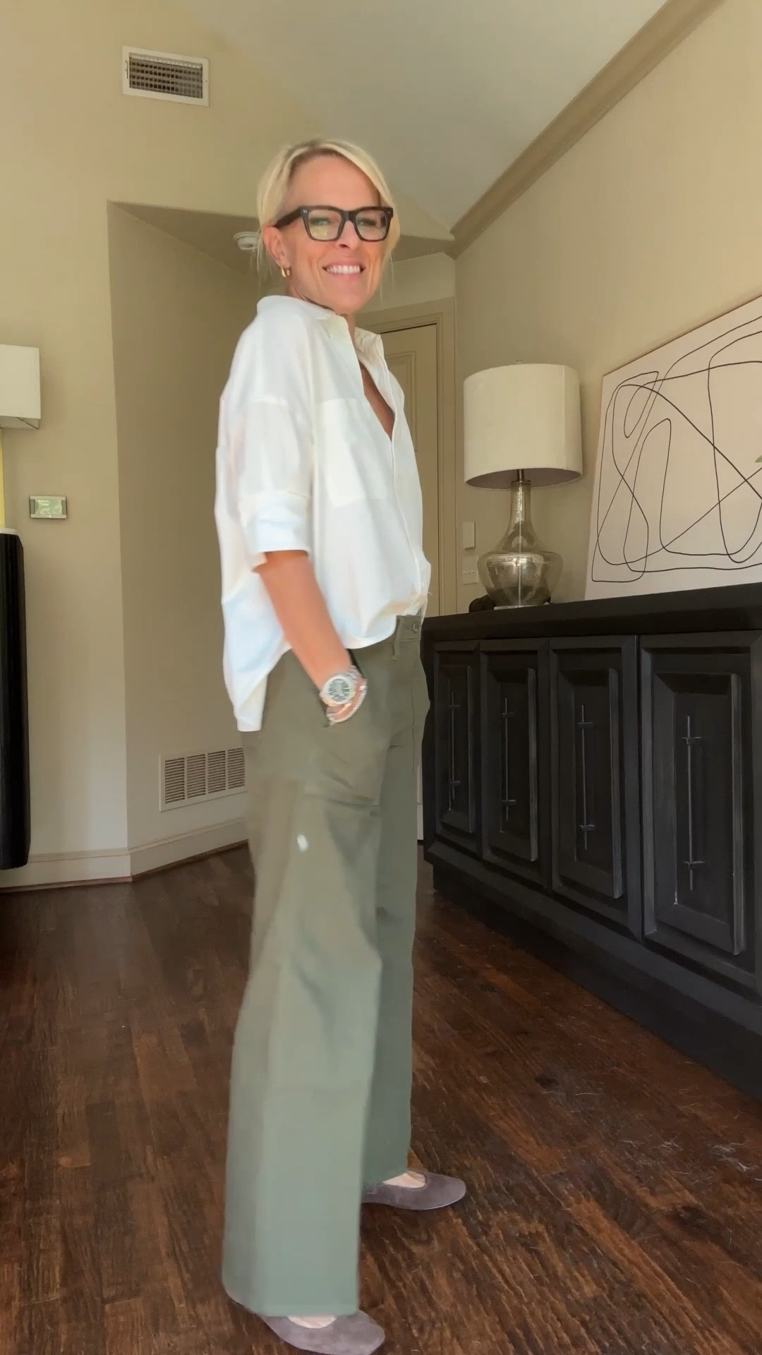 Anthropologie white button up TTS
green J Crew pants 
Dolce vita ballet flats 

#LTKOver40 #LTKStyleTip #LTKFamily