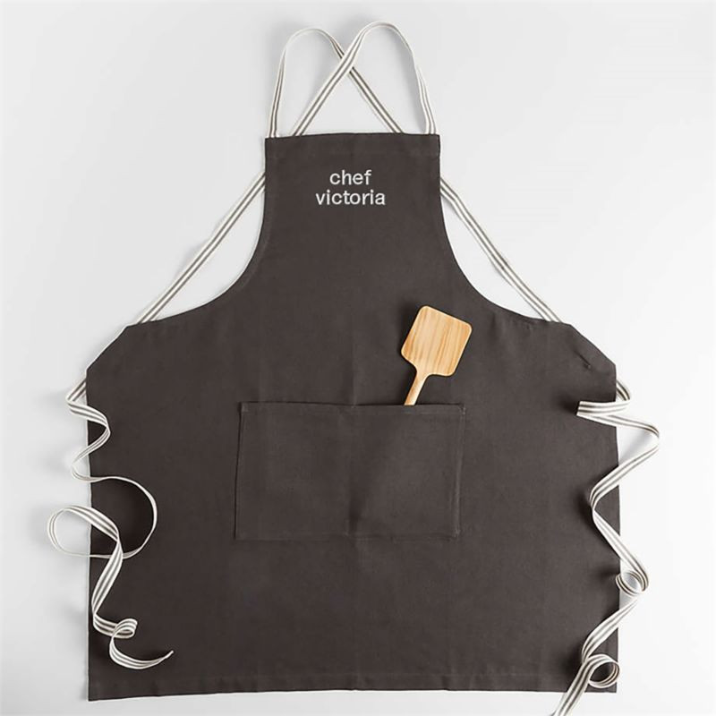 Oslo Cross-Back Grey Linen-Organic Cotton Apron with Pocket + Reviews | Crate & Barrel | Crate & Barrel