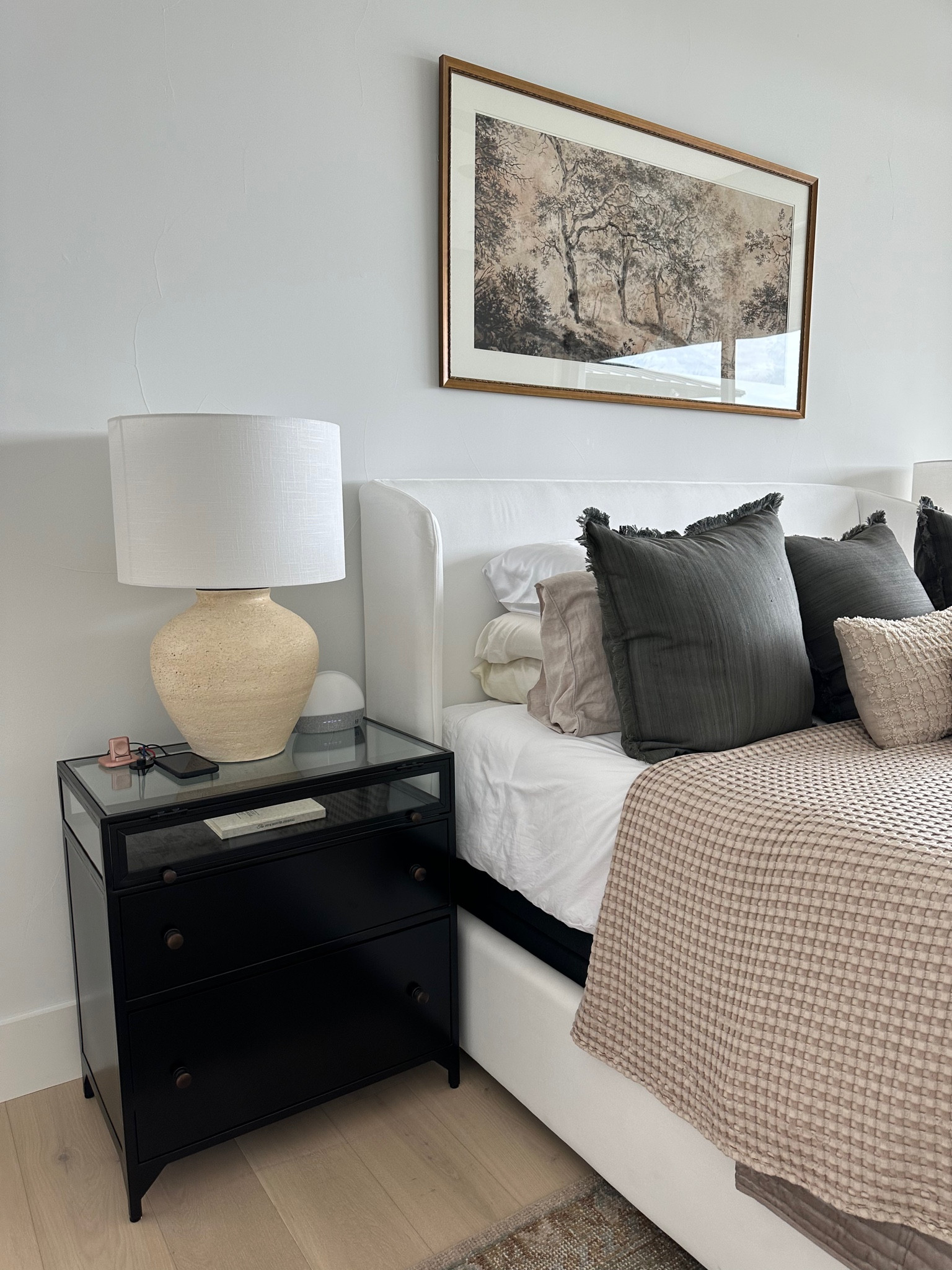 Primary bedroom neutral modern design
Studio McGee
Black side tables
