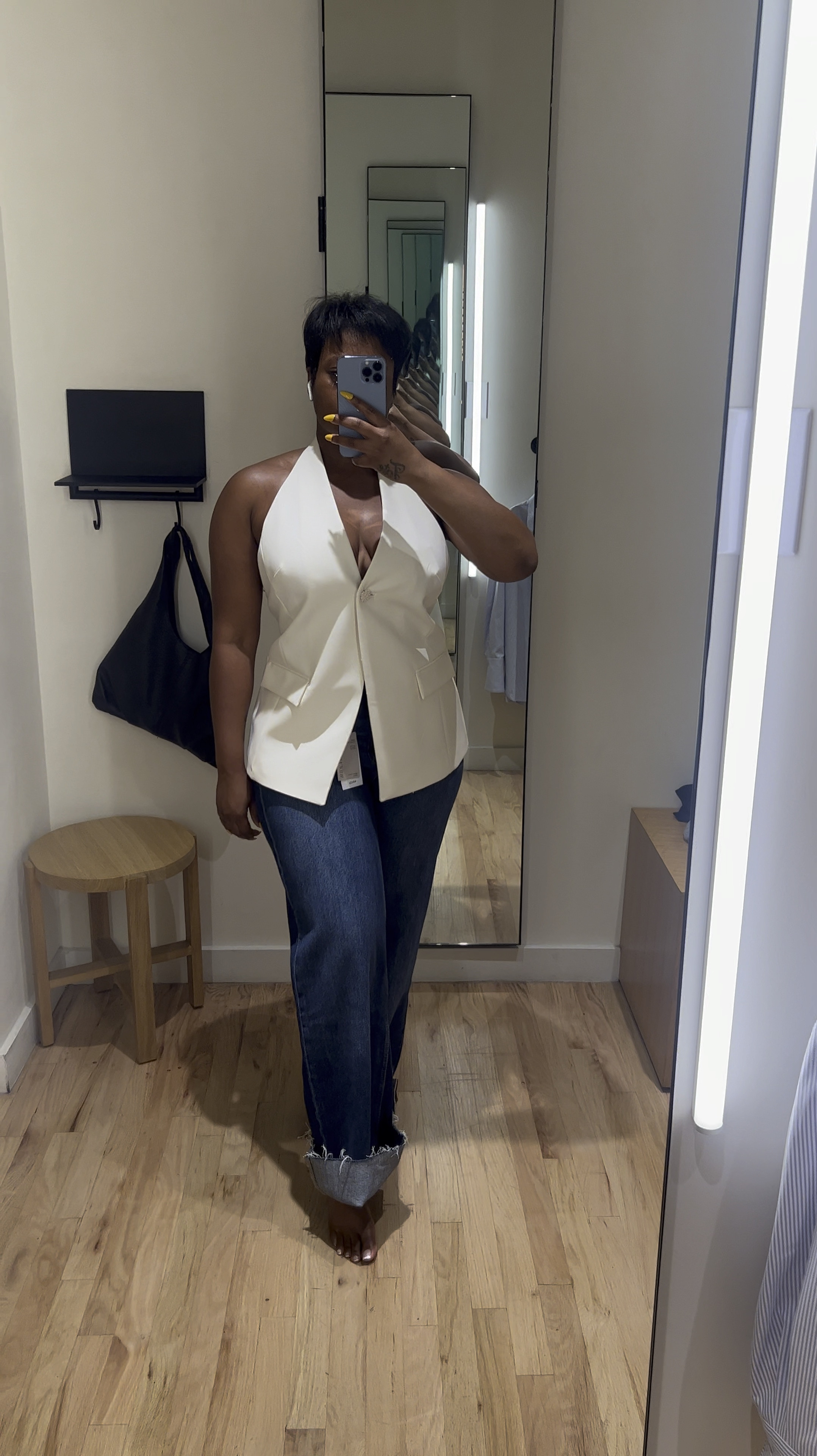 Mango try on haul

Wearing a size large in halter top vest
Wearing size 10 in jeans 