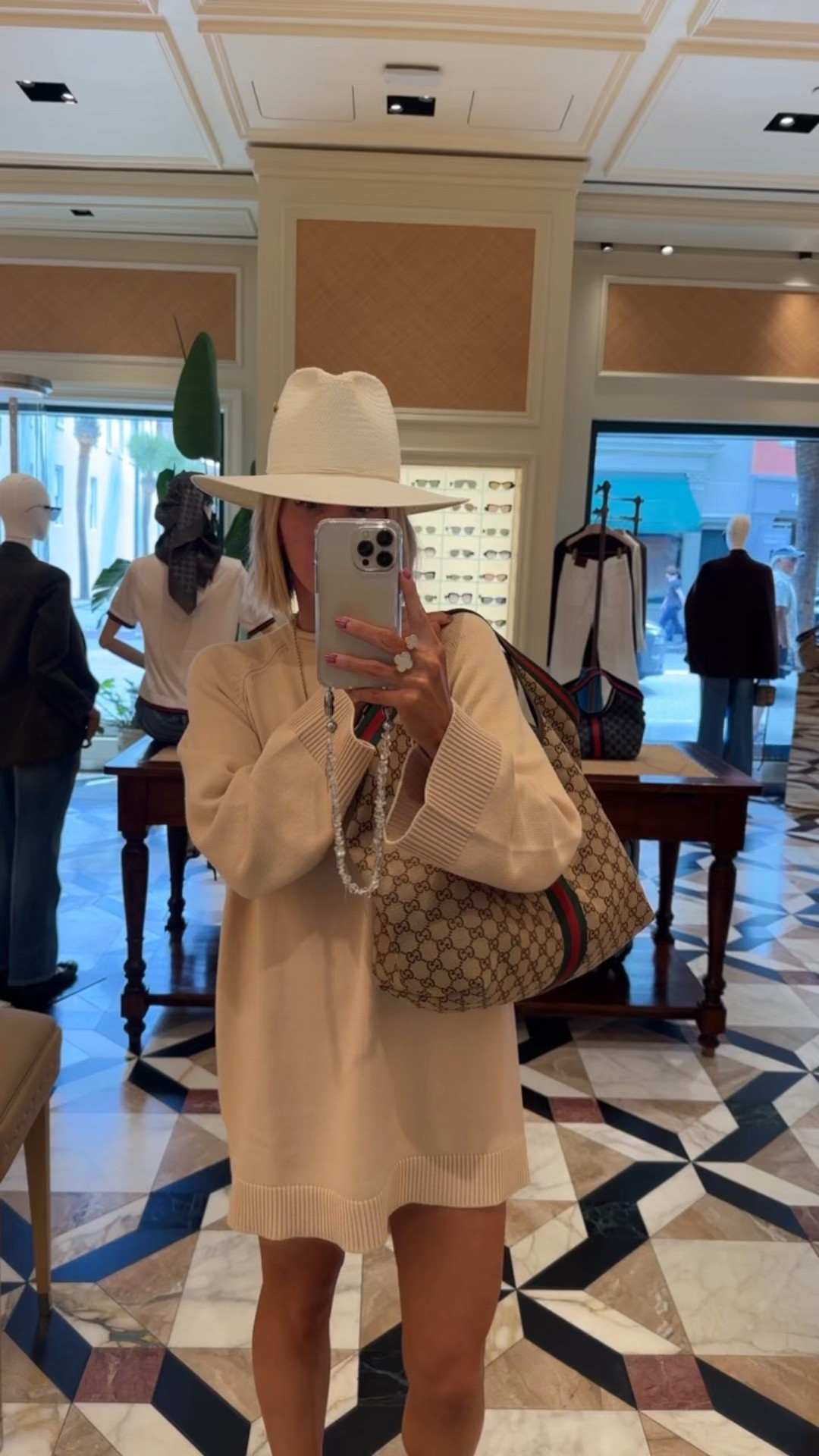 The only hat I take on warm weather vacays and the cutest sweater dress. 