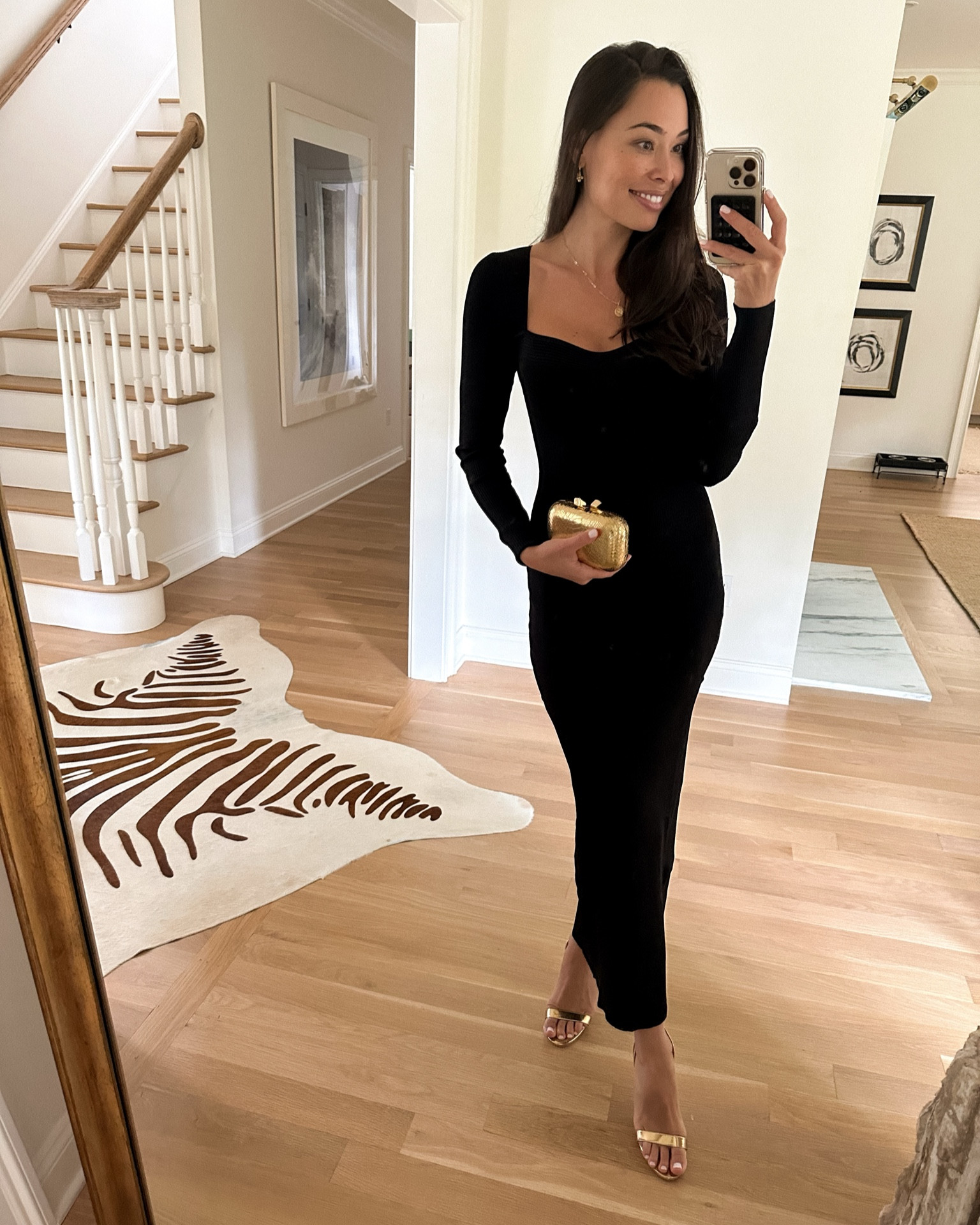 Kat Jamieson wears a black cocktail dress perfect for the holidays. Holiday style, little black dress, gold clutch, gold heels, sandals, formal, party, wedding guest, date night, event. 

#LTKSeasonal #LTKHoliday #LTKwedding