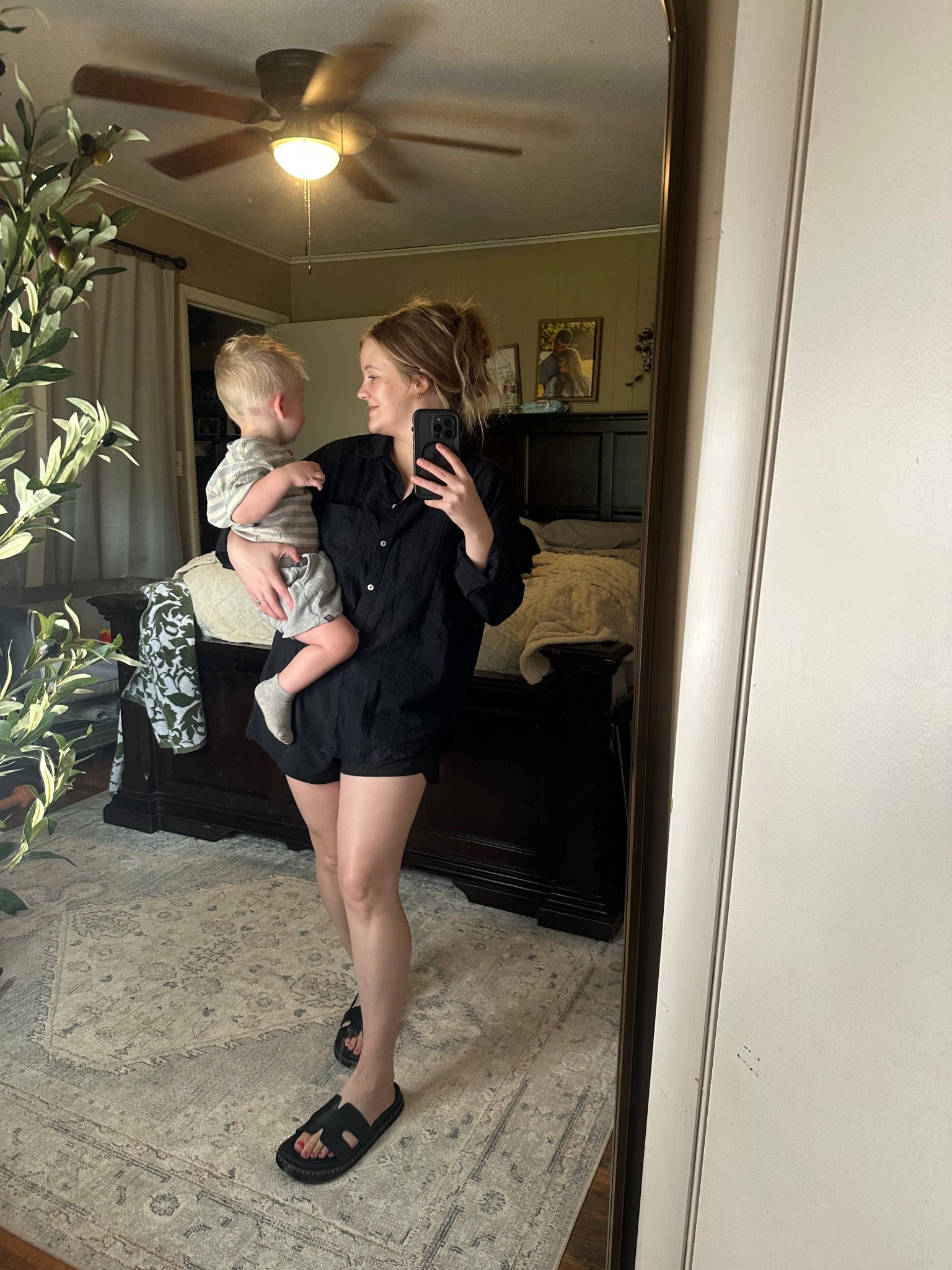 Summer outfit all black linen shirt and running shorts, my go to comfy mom outfit especially when I’m feeling bloated.. 🫠🫶🏼👶🏼 Cam’s outfit is modern moments & waffle knit material so good for summer 

Sized up to medium in top for a looser fit and bottoms are large (140lbs) 5’4 for reference 🫶🏼 8 in sandals tts 

Boys outfit Toddler Outfit Baby Outfit Mom Outfit Summer Outfits Walmart outfits Amazon outfits summer sandals 