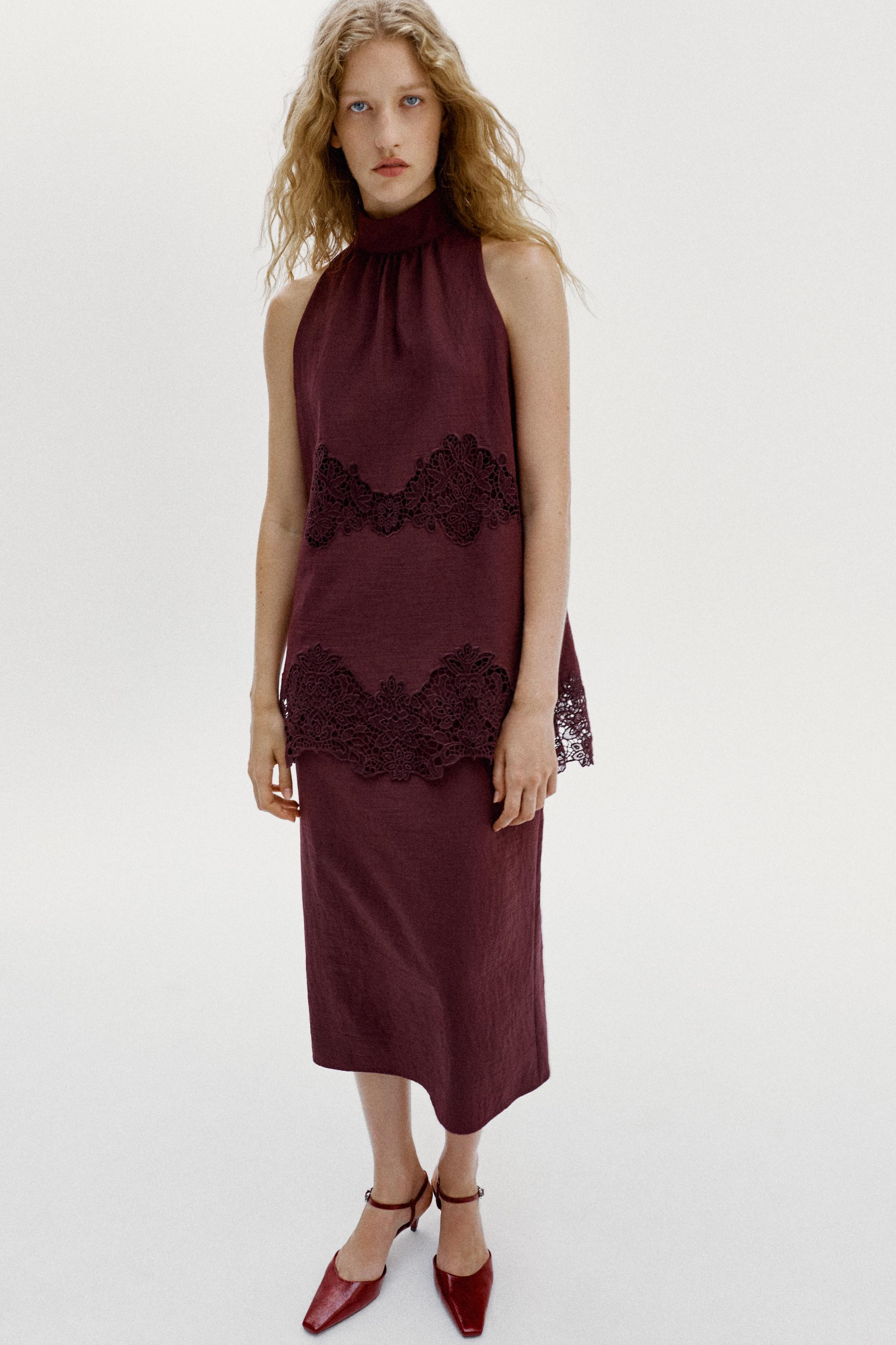 Double-layer midi dress with a high neck. Features matching perforated embroidery detailing. Back... | Zara US