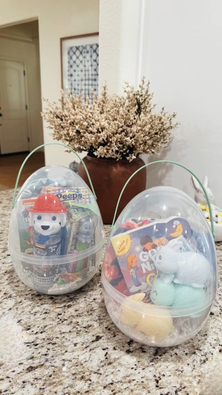Here are some Easter gift ideas using these large clear 10 inch eggs.  Just take the 19 colorful eggs out of the clear egg and you can use the colorful eggs for your hunt on Easter morning.  Use the 10 inch clear egg to fill with goodies.  I filled them with crinkled paper and for my nephew I added an outfit, bubbles, book, chalk, and PEZ.  For my niece I added an outfit, swimsuit, book, and bunny bath toys.  I love that the clear egg snaps together so nothing will fall out.  The Easter eggs and all the items can be found at my favorite store. 

#LTKSeasonal #LTKkids #LTKbaby