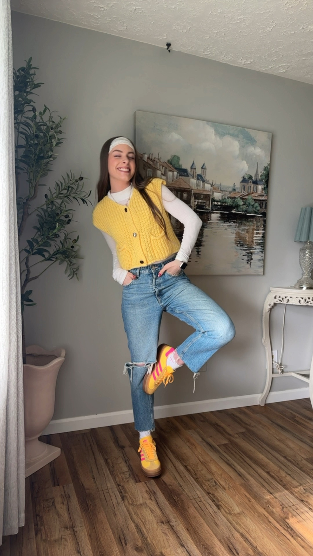 OOTD 5/20/25

Yellow chunky cropped sweater vest with large gold buttons detail, open weave knit sweater vest, sleeveless short sleeve sweater for summer, layered outfit for spring, summer layers, Zara mom jean raw hem cropped knee slit distressed denim, tall girl friendly jeans, ruffle ankle socks, bow socks, adidas gazelle yellow pink platform gum sole sneakers, affordable jewelry, custom charm necklace, floral pattern headband, cute pack of headbands Amazon 

#LTKFindsUnder50 #LTKSeasonal #LTKStyleTip