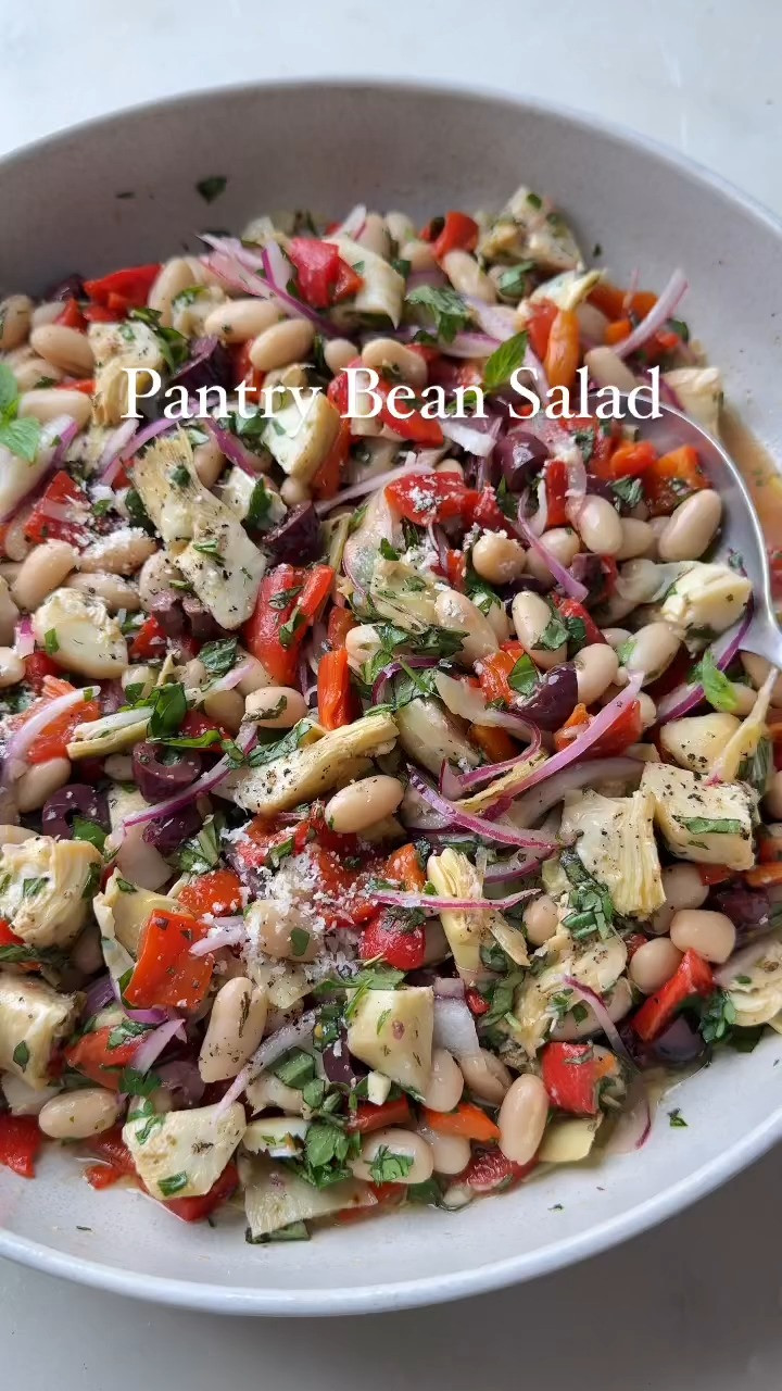 PANTRY BEAN SALAD

This easy Pantry Bean Salad is my current lunch obsession!😋

It’s made from mostly pantry staples, no cooking required. White beans, marinated artichokes, roasted red peppers, olives, red onion, and herbs are tossed in a zippy Italian dressing.

It’s so versatile! Eat it straight from the bowl, eat with pita chips, pile it on ricotta toast, or serve it over greens or pasta—it’s seriously SO good and perfect for meal prep!💯 Full recipe on my blog: https://www.twopeasandtheirpod.com/marinated-artichoke-roasted-red-pepper-white-bean-salad/ 

 #LTKSeasonal #LTKFindsUnder50 #LTKFindsUnder100