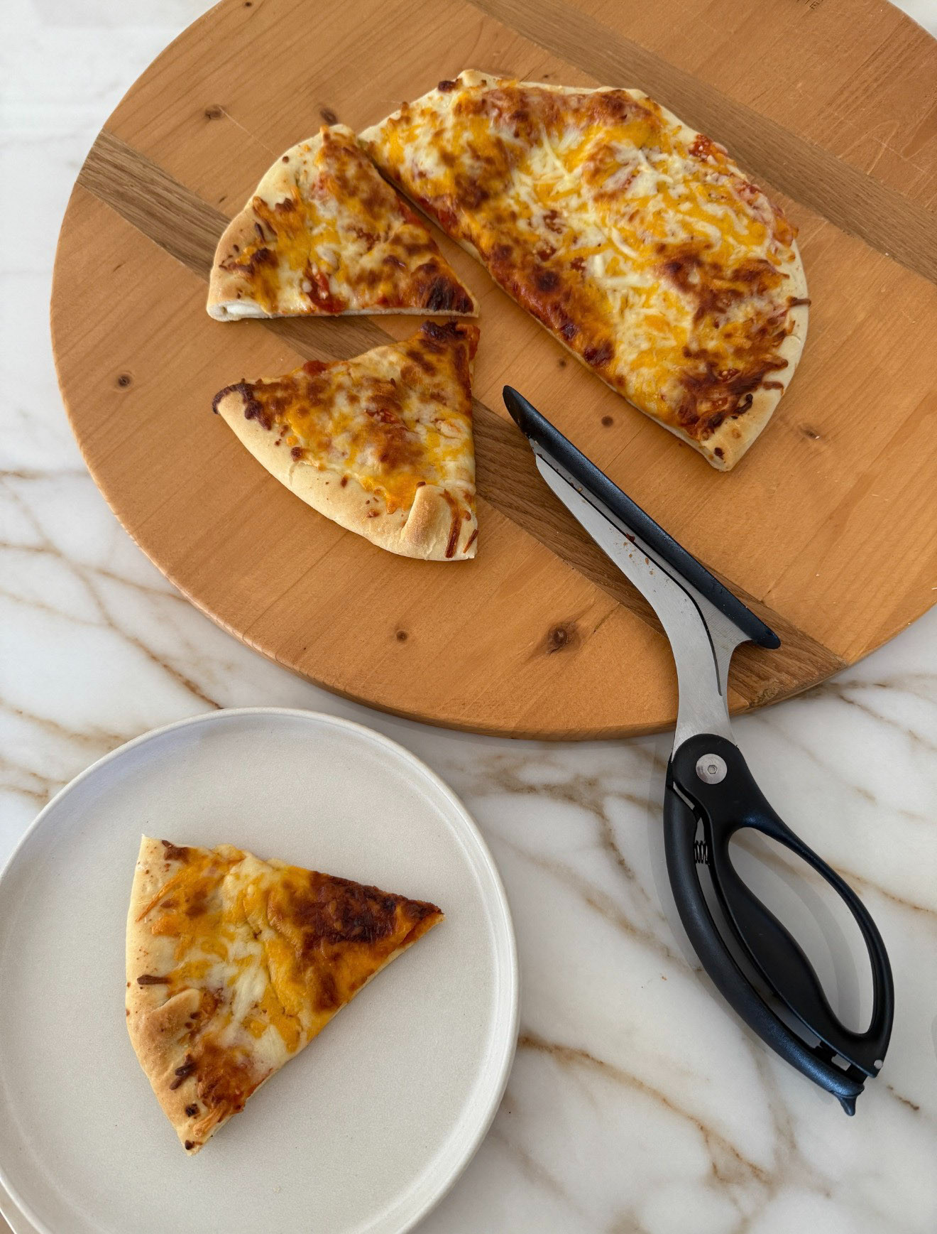 My new favorite kitchen gadget that easily cuts through pizza and grabs slices. Sharpest decision I have made all week!  

 #LTKfoodie #LTKHome