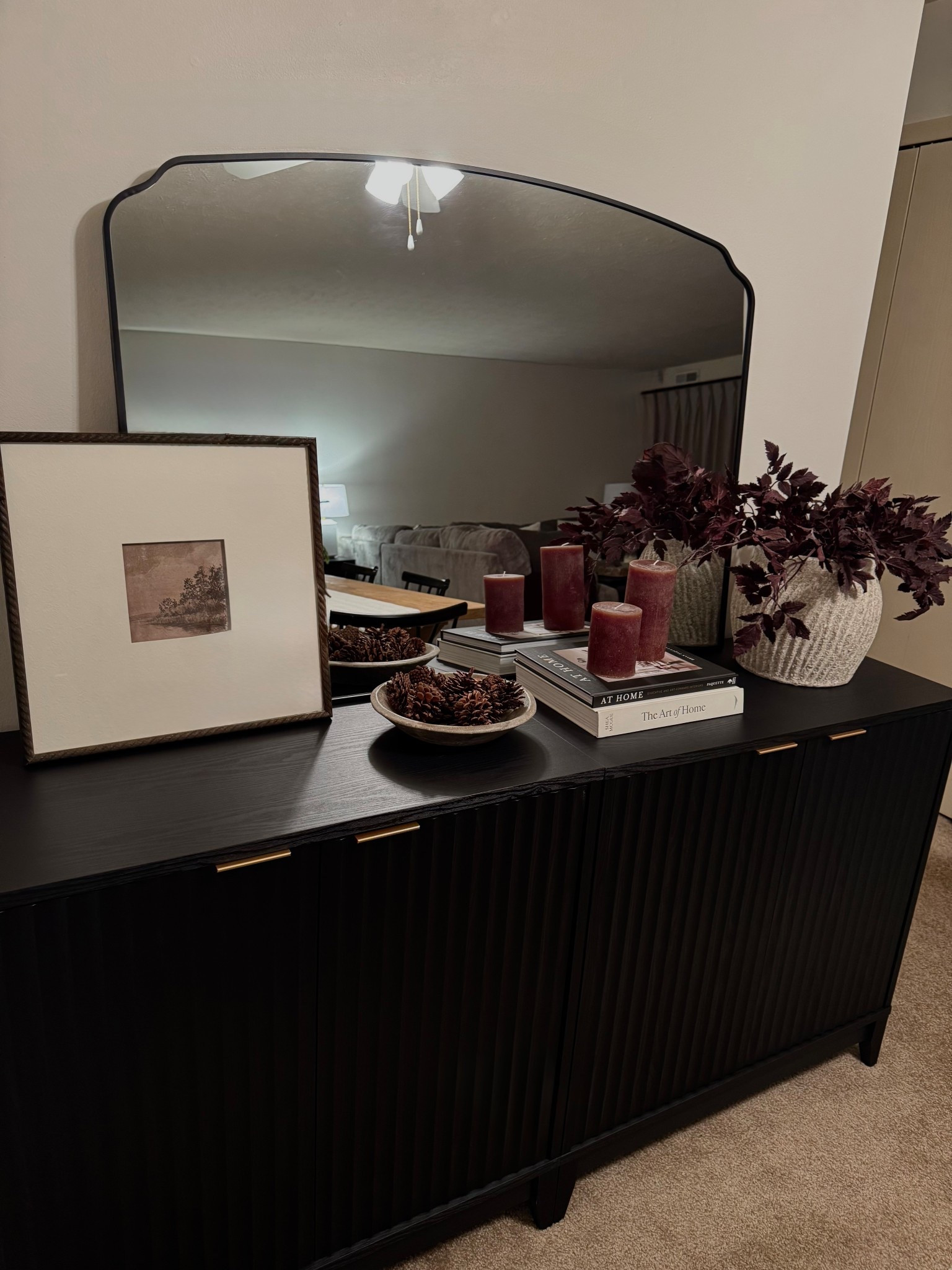 Winter sideboard styling, Christmas decor, moody Christmas, black sideboard, bowl, pine cones, Michaela, cottage and key, mopio, Amazon furniture, plum stems, beige vase, coffee table books

#LTKHoliday #LTKHome #LTKSeasonal