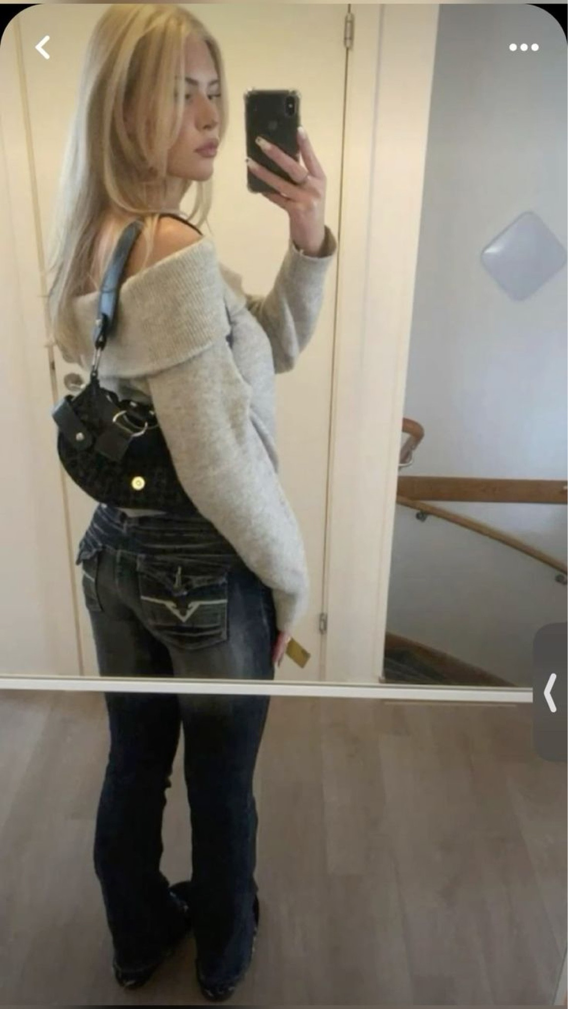 Cute casual or date outfit idea. Grey off the shoulder sweater paired with low rise dark wash jeans and black purse. 

#LTKShoeCrush #LTKSeasonal #LTKHoliday