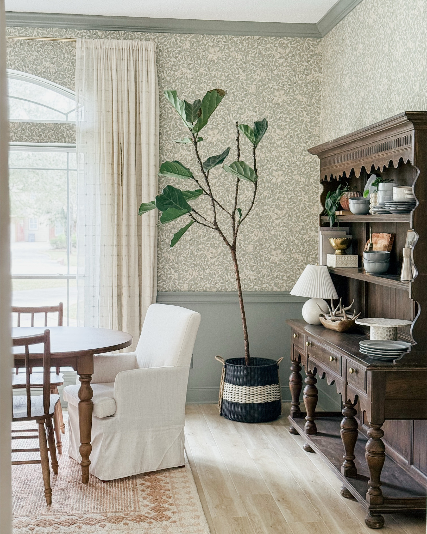 Dining room reveal!!! Wall color is Evergreen Fog! 😍 

THEBLOOMINGNEST curtains chair dining chair table dishes 

#LTKHome #LTKFindsUnder50