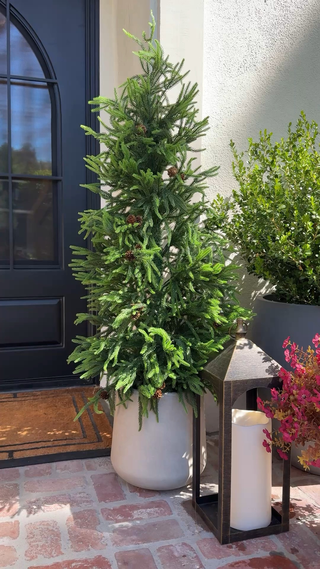 Holiday front porch pine trees! I have the 60” tall and they are UV resistant! They look so pretty!!!