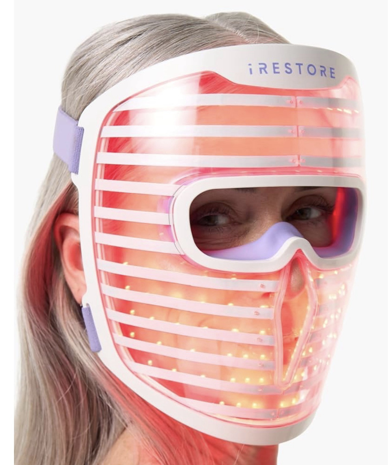Brand iRestore
Item Form Mask
Product Benefits
Anti Aging, Fine Lines and Wrinkles Treatment, Radiant Skin, Redness Treatment, Smoothening, Supports Skin's Natural ToneAnti Aging, Fine Lines and Wrinkles Treatment, Radiant Skin, Redness Treatment, Smoothening, Supports Skin's…
See more
Scent Unscented
Material Type Free Chemical Free, Oil Free, Paraben Free
Skin Type All, Combination, Normal, Oily, Sensitive
The Most Powerful Red Light Mask for Visible Results: Experience professional-level rejuvenation at home with 360 LEDs, experience 2X the power. Targets fine lines, wrinkles, uneven tone and dull skin to help reveal smoother, firmer, youthful-looking skin. Ideal for women and men looking to address wrinkles and signs of aging in the face.
Advanced Triple-Wavelength Technology: Powered by 3 scientifically backed wavelengths - Red (635nm), Infrared (830nm), and Blue (415nm), this LED face mask allows you to choose targeted treatments for your specific skin goals; boost collagen, calm irritation, clarify blemishes, and reduce dark spots for a brighter complexion.
Designed for Comfort and Multitasking: Lightweight yet sturdy, our dual-strap face mask hovers comfortably over your face and blocks direct light from your eyes, so you can relax or multitask safely during each session. Perfect for sensitive skin, evening self-care and morning routines.
Simple, Efficient, and Time-Saving Skincare Routine: Achieve effective results with quick 10 minute sessions, 3-5 times a week. Can be used with your favorite face brightening serums or moisturizers to enhance absorption and hydration benefits; ideal for dry or oily skin, no messy gels or downtime required.
Trusted, Proven, and Backed by Science: With 20+ years of R&D and over 500,000 customers, iRestore is a dermatologist-recommended US brand known for safety and durability. Enjoy facial spa-quality results at home, your satisfaction is our priority.

#LTKselfcare #LTKBeauty #LTKSaleAlert