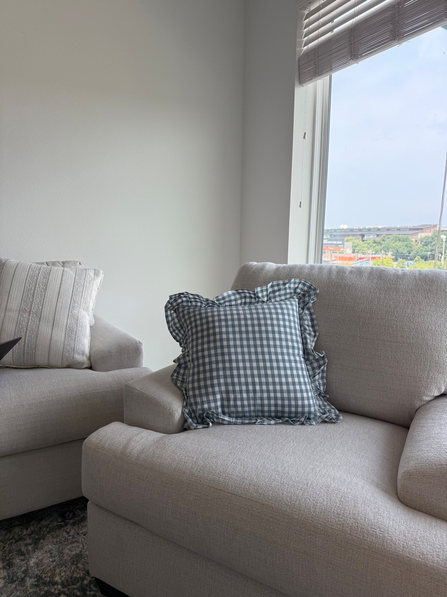 Loving these blue gingham pillows! these are 18x18 & I bought a 20x20 insert to puff them up more!

#LTKFindsUnder50 #LTKHome