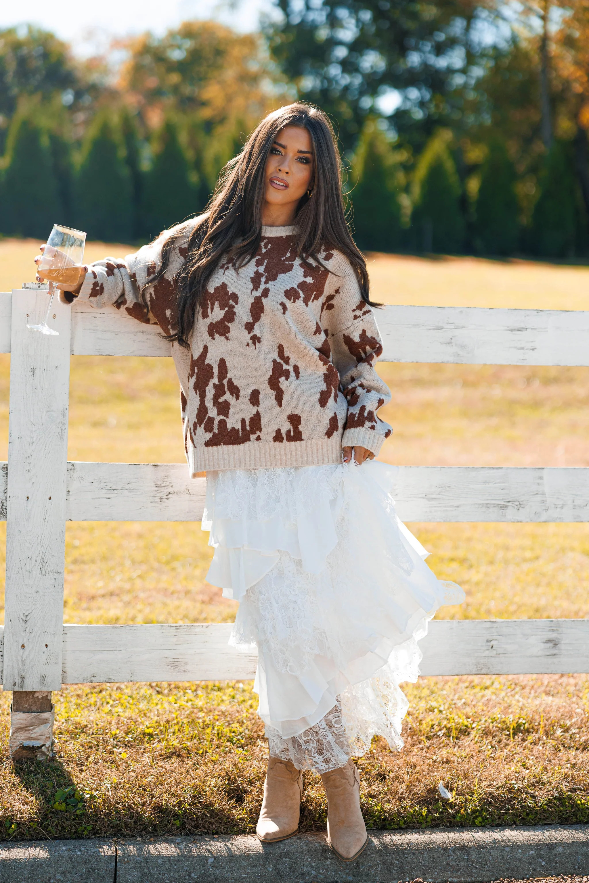 Oversized Cow Print Sweater | Lane 201 Boutique