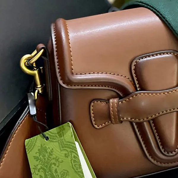 Luxury Designer Cowhide mini Crossbody Bag with Original Hardware Classic Flip Messenger Bag | DHGate