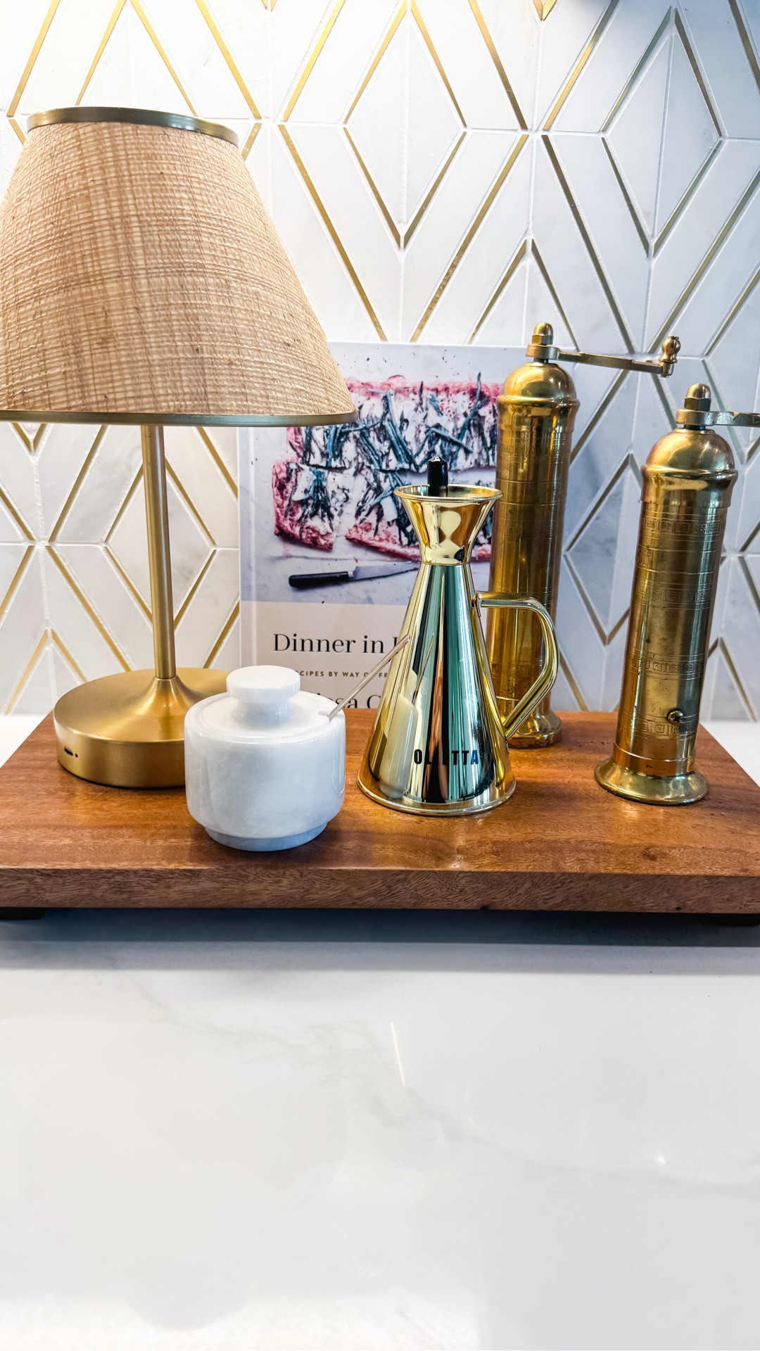 This simple wood riser completely changed how my kitchen counters look and feel — it instantly makes everyday items like olive oil, salt and kitchen essentials look more styled and intentional without adding clutter. I just added this rattan cordless lamp too  I love how it adds warmth, height and organization while still keeping everything minimal and functional, and it’s one of those small upgrades that makes a big difference in your space. Save for later and follow me on LTK for daily home decor, Amazon finds and easy kitchen styling ideas.

#LTKSaleAlert #LTKHome