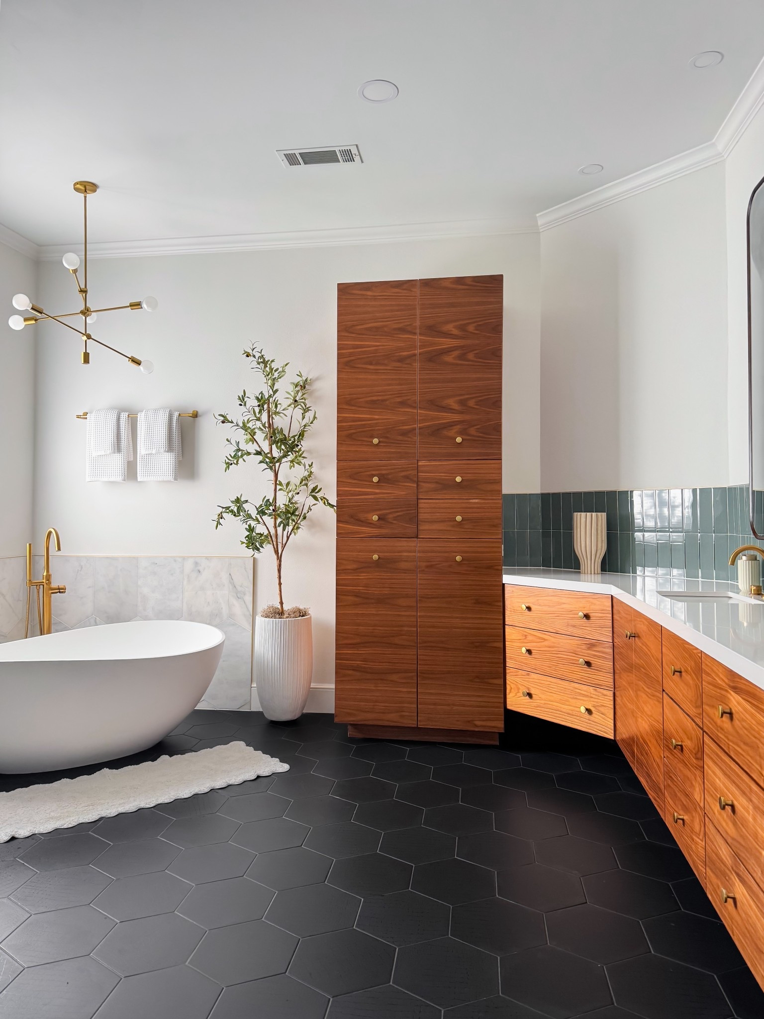 Viral Amazon planter is back in stock! I love how this faux olive tree adds so much elegance to my master bathroom. 

#LTKHome