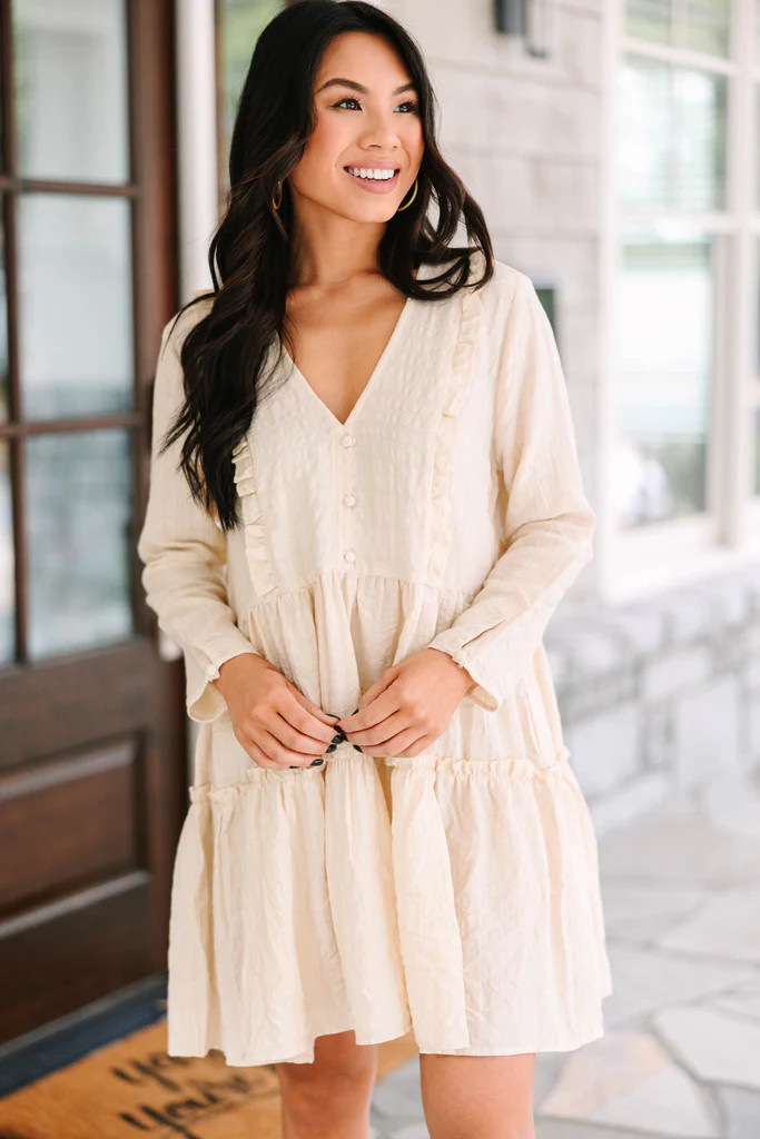 It All Starts Here Beige White Ruffled Babydoll Dress | The Mint Julep Boutique