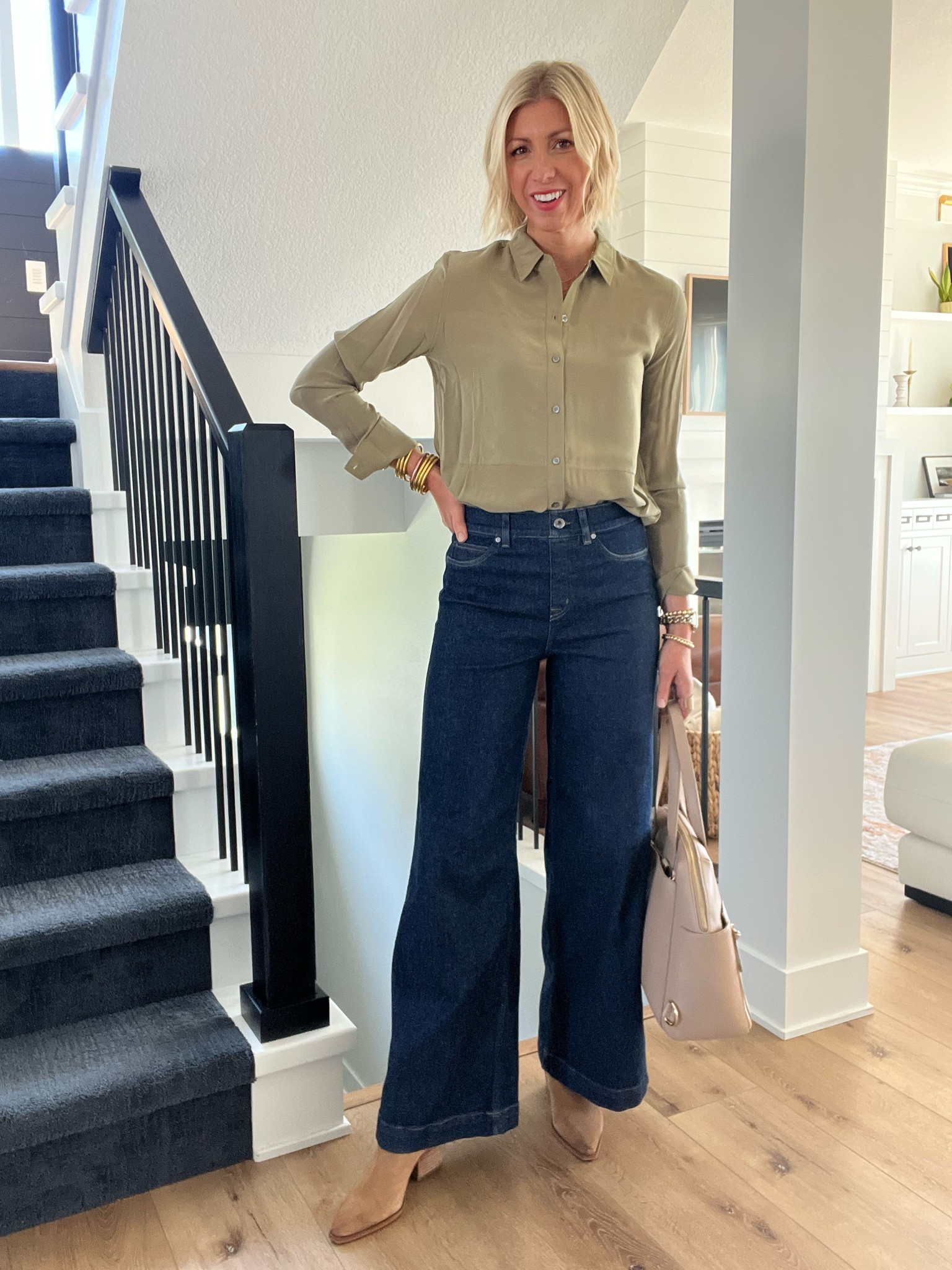 Wide leg jeans outfit for work! Paired w/ a silk blouse & booties. 

These have amazing stretch & are very comfortable 

wearing size medium
 (I’m 5’10” for height reference) 
Use my code: SARAHKELLYSTYLE
for 10% off both jeans & silk blouse

#LTKstyletip #LTKFind #LTKworkwear