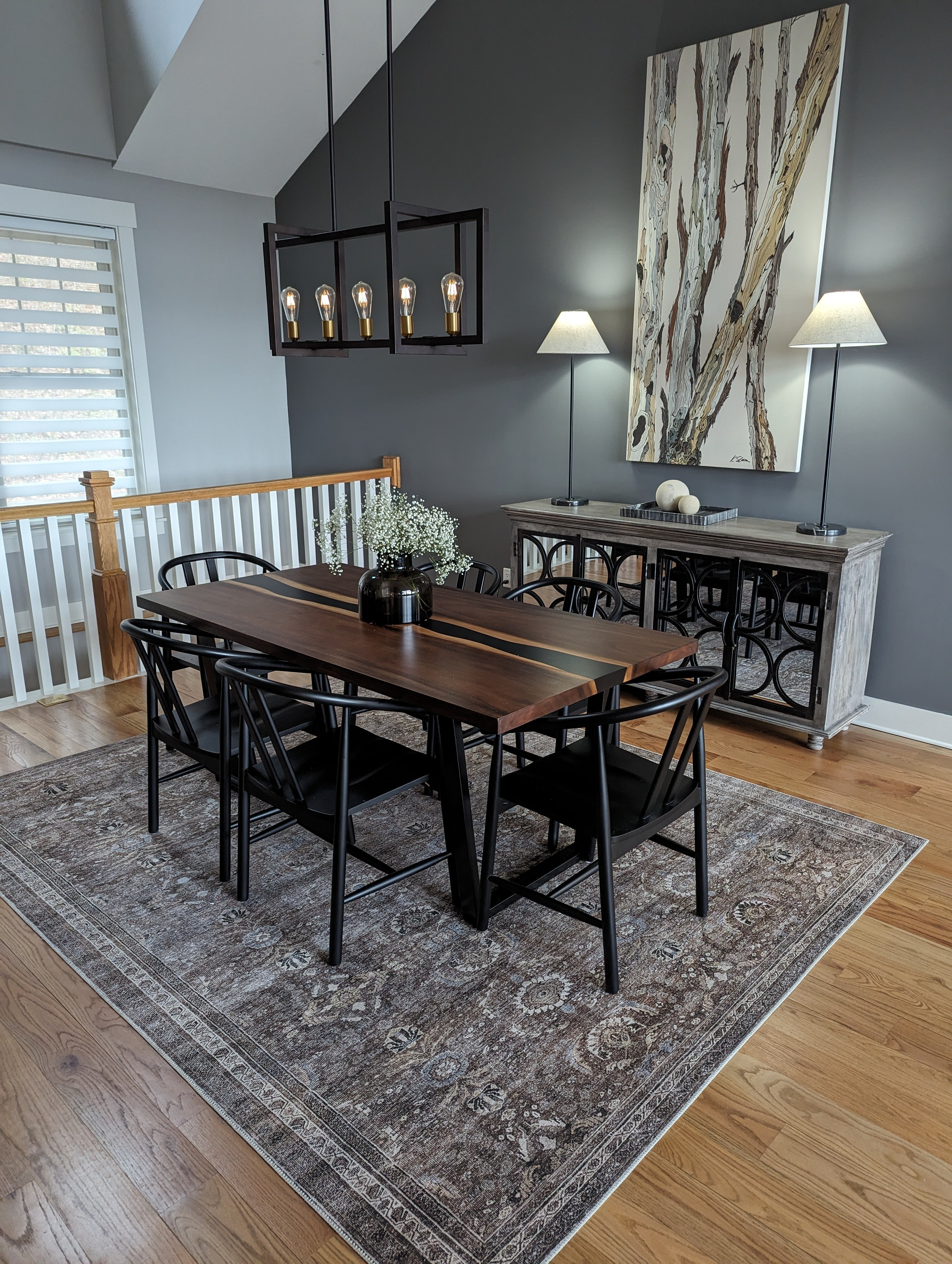 My sideboard with iron framed mirrored doors is from Nadeau furniture purchased locally but I found some similar options#diningroom #treeart #transitionaldiningroom #blackdiningchair #diningtable

#LTKhome #LTKfindsunder100 #LTKfindsunder50