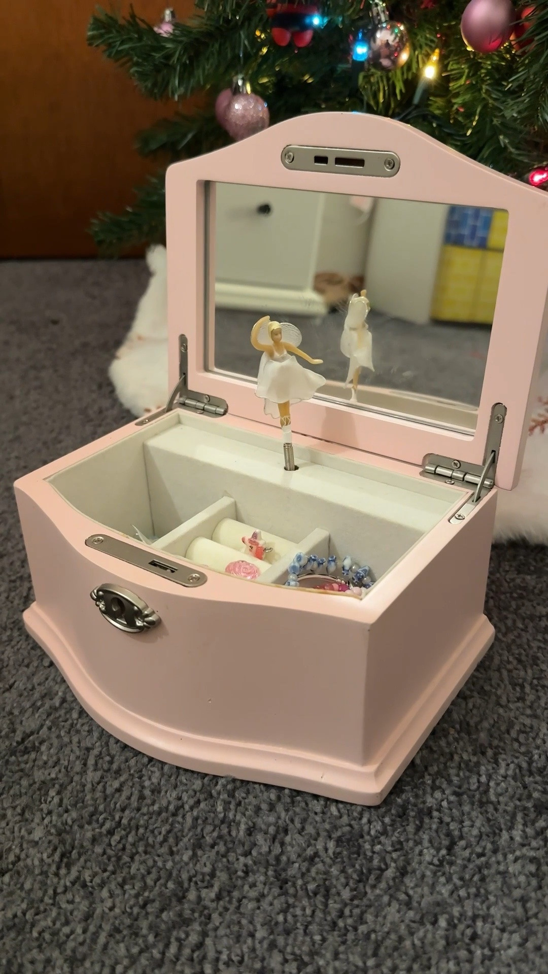 This little jewelry box is such a sweet gift idea for any little girl who loves pink! It plays a song when you wind it up in the back and the ballerina twirls—it even comes with two ballerinas that can be switched out. This is the medium size. 

#LTKHome #LTKGiftGuide #LTKKids