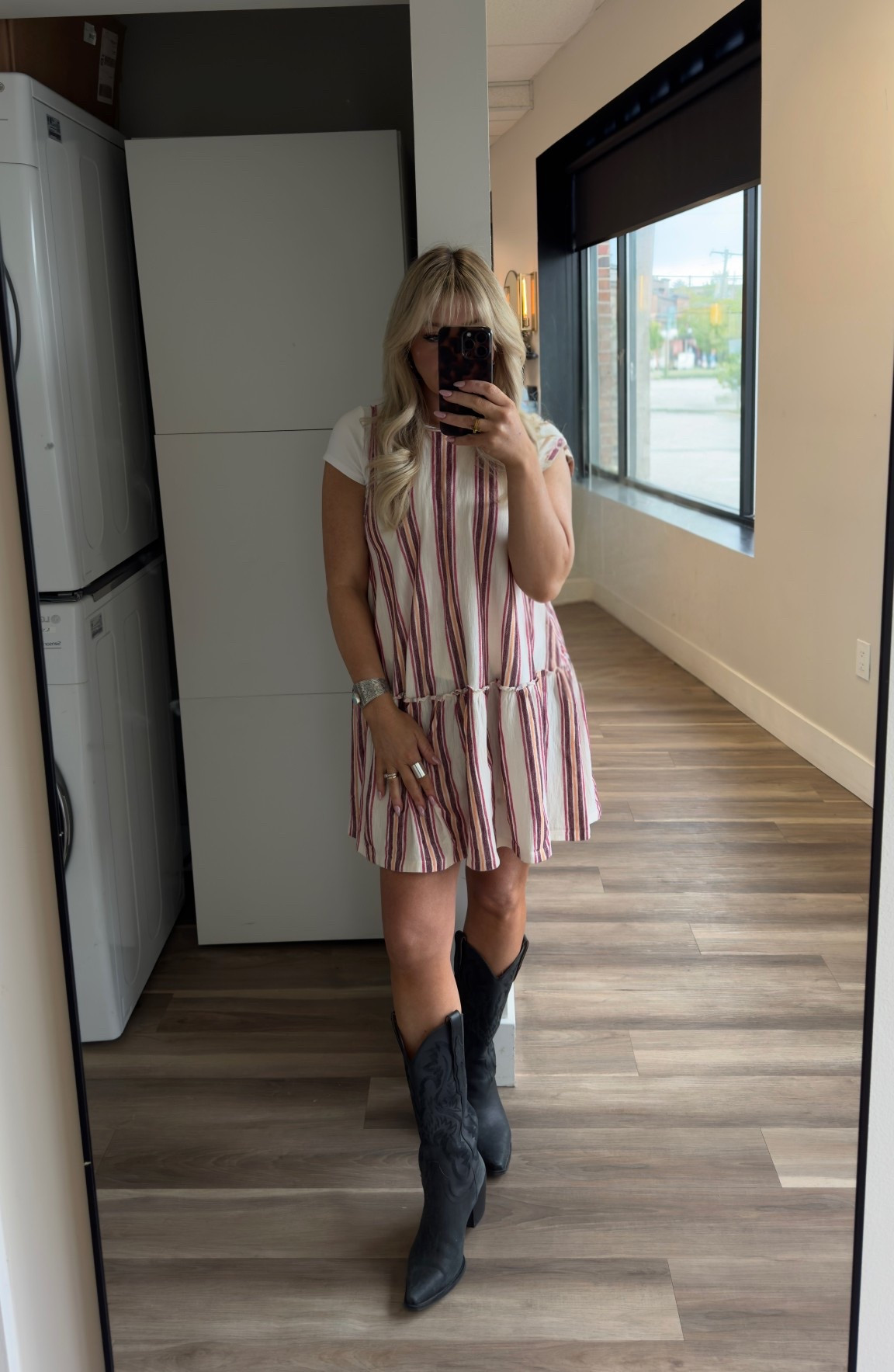The perfect colorful dress to introduce into my spring wardrobe 
American Eagle dress size small 
White basic tshirt size small 
Black western boots size 7 

#LTKFestival #LTKootd #LTKSeasonal