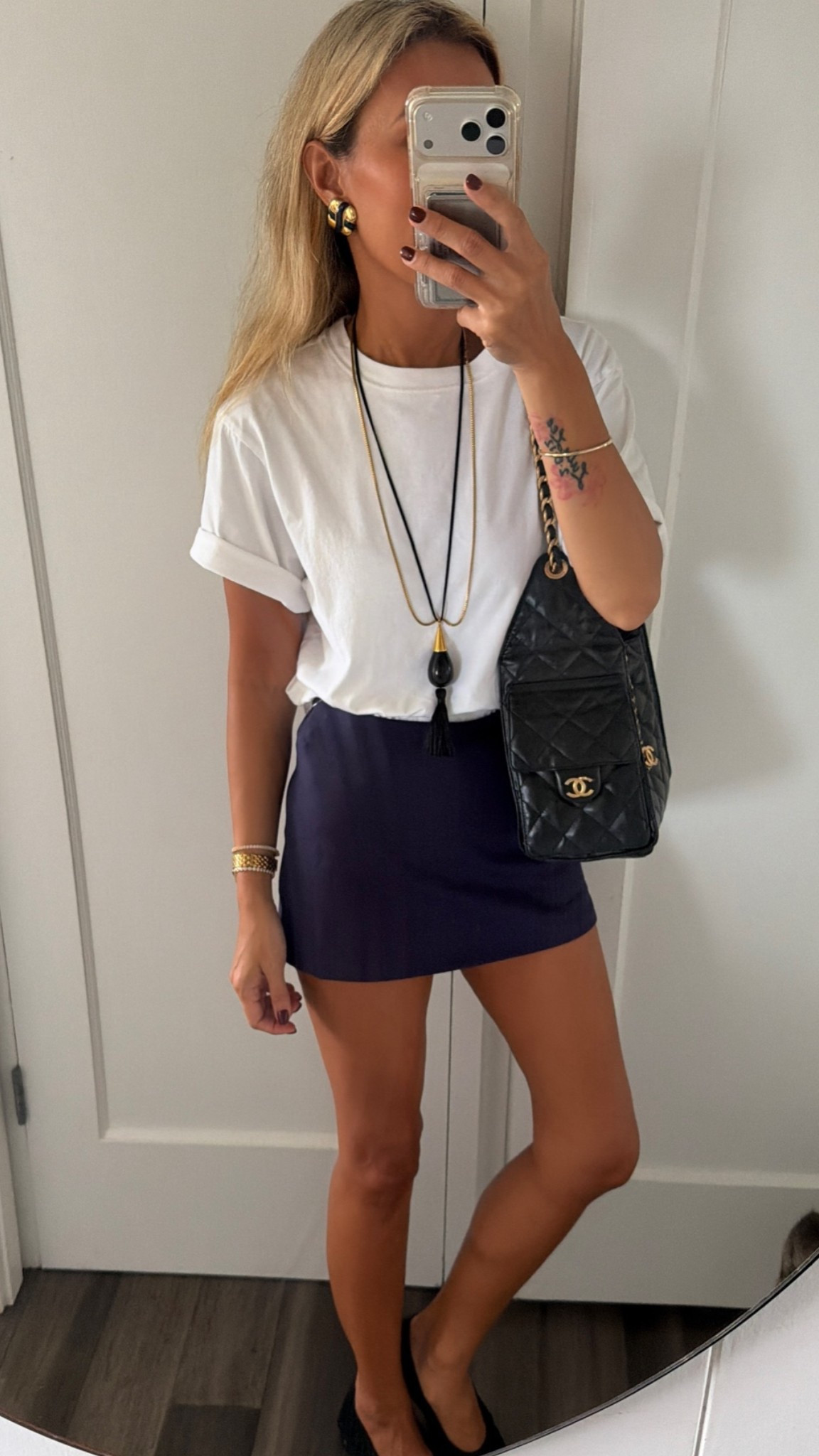 The richest plum colored skirt in XXS. Xs tee.

#LTKootd #LTKOver40 #LTKPetite