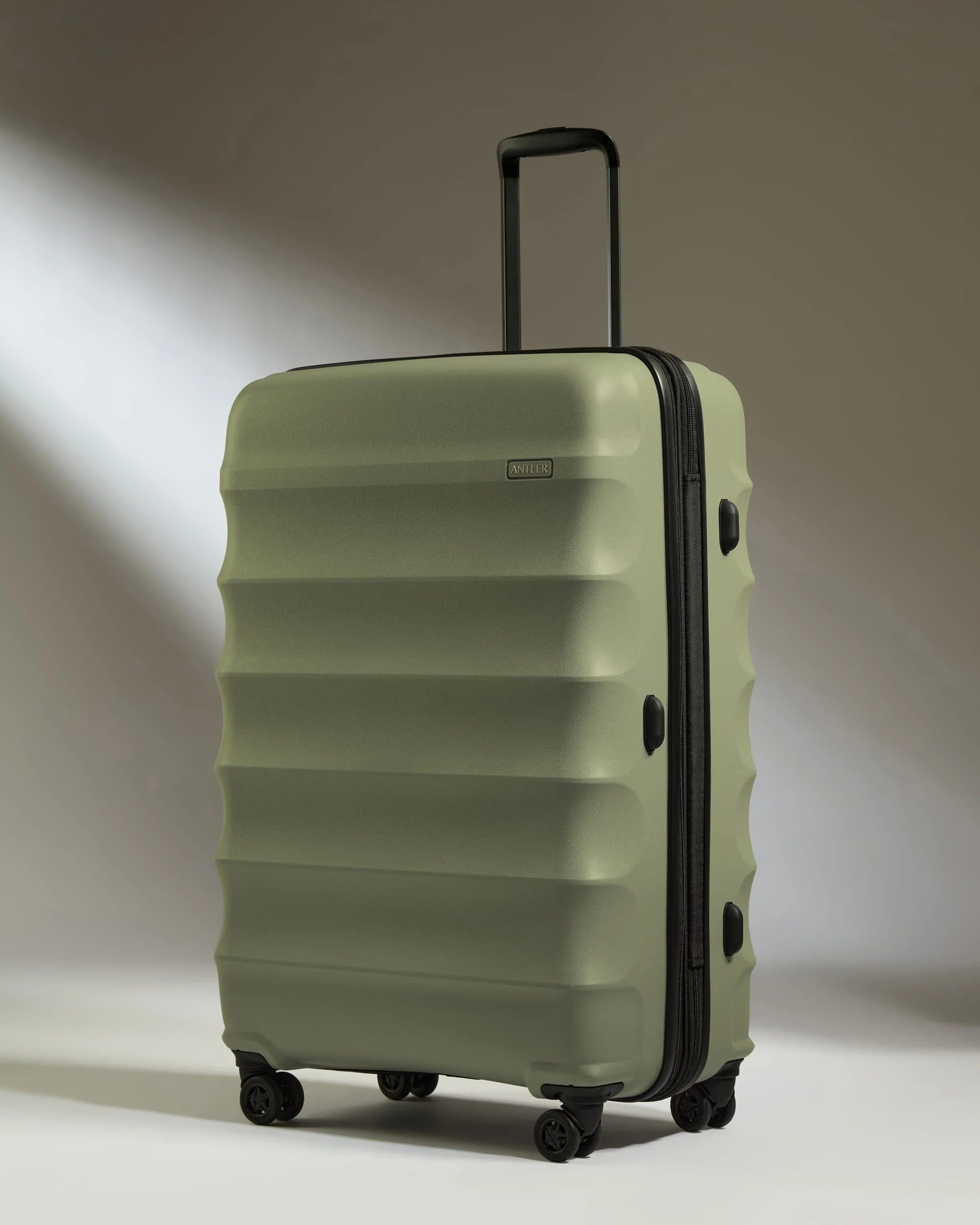 Large Suitcase in Olive Green - Juno | Checked Luggage & Large Suitcases | Antler UK
