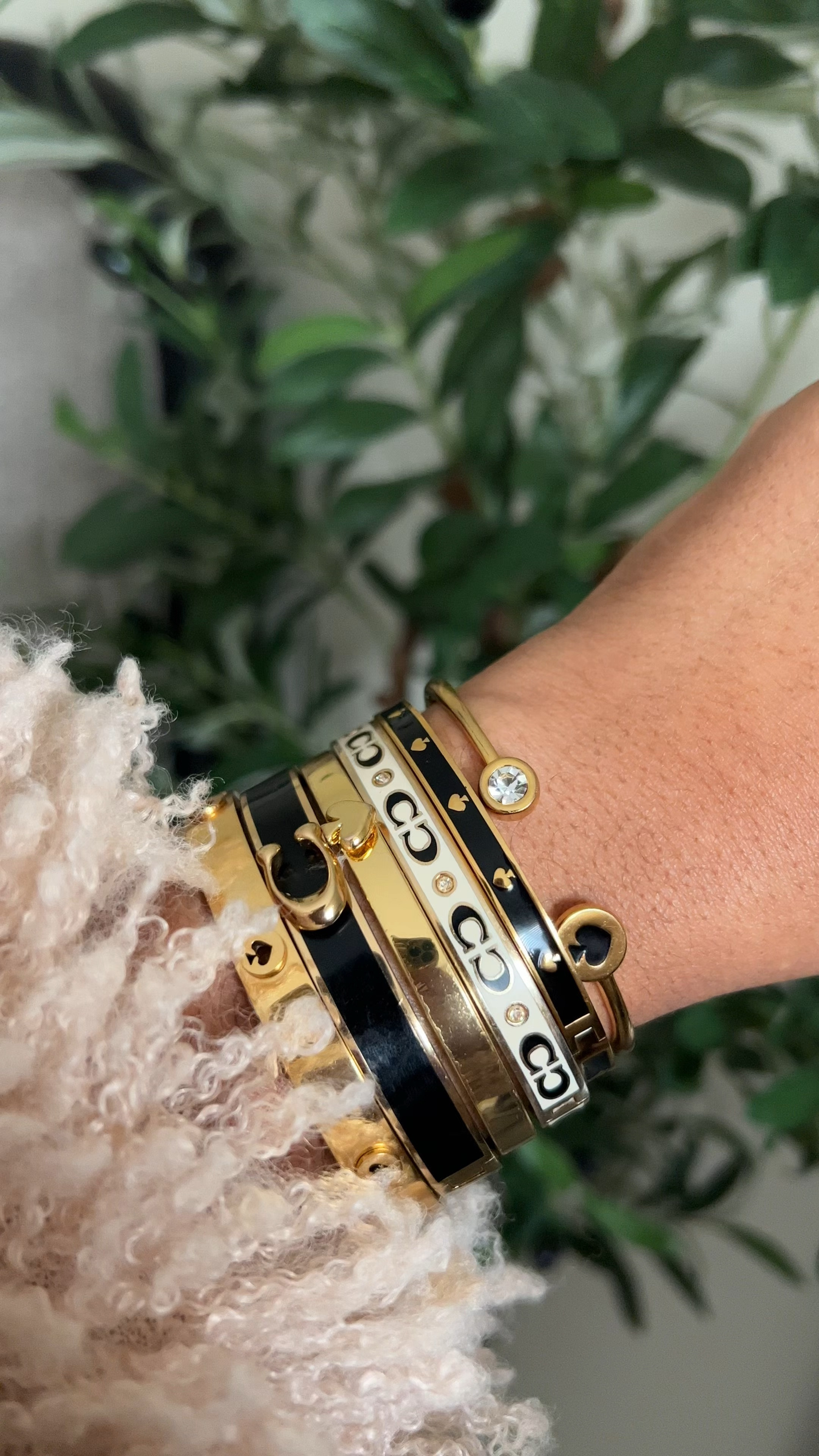 Bracelet stack. #goldjewelry #twotonejewelry #mixedmetals #goldbracelets #katespades #coach

#LTKStyleTip